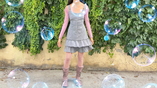 Discover unusual vintage dresses by Wanda Core, inspired by Harajuku, cyber dystopia, and the weird girl aesthetic. Muted, minimalist yet playful silhouettes blending futurism and nostalgia, one-of-a-kind pieces for timeless self-expression.