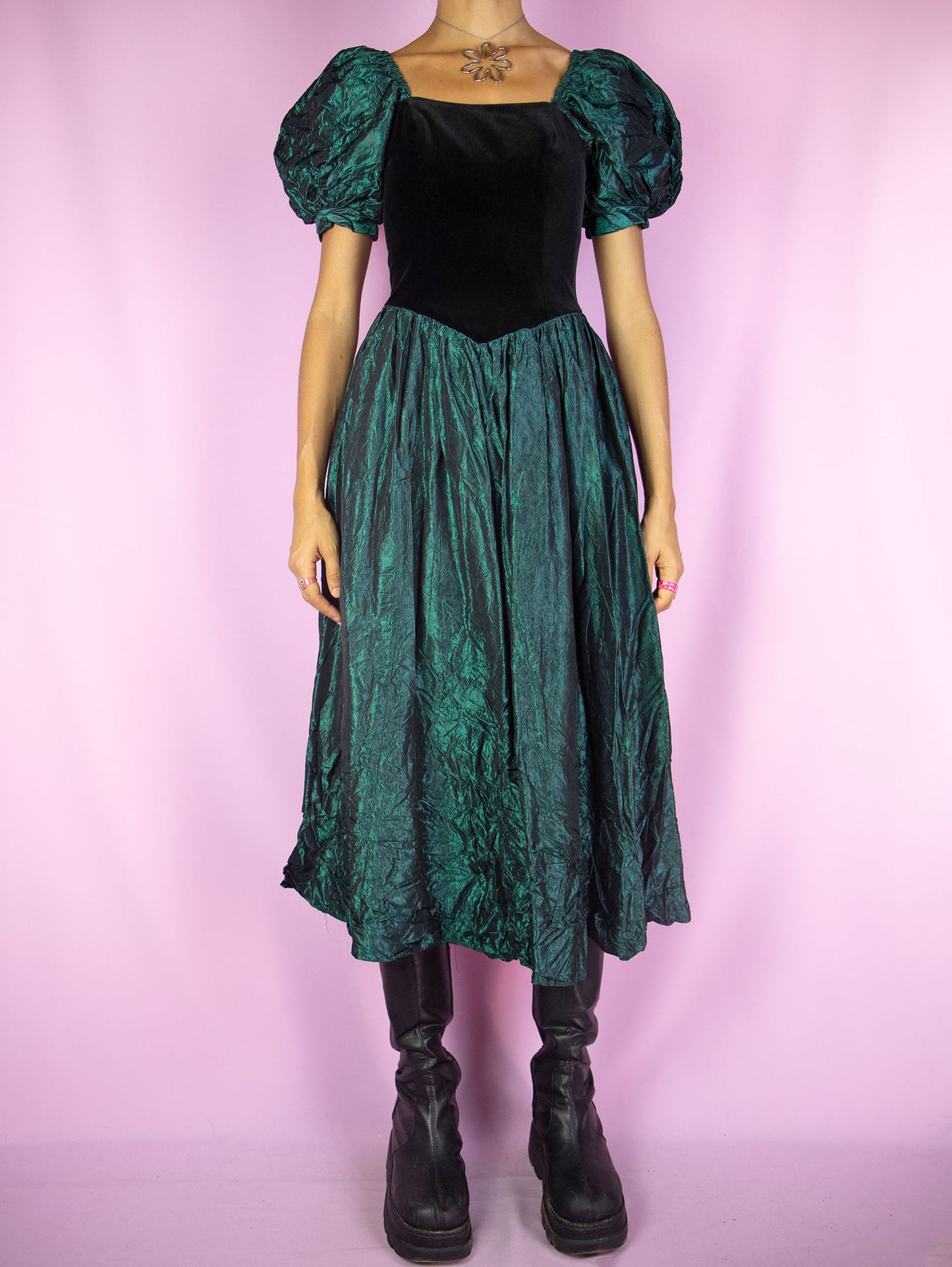 The Vintage 90s Puff Sleeve Midi Dress is an iridescent green flared dress with puff sleeves, black velvet front and back zipper closure. Cottage regency inspired 1990s dark romantic whimsygoth maxi dress.