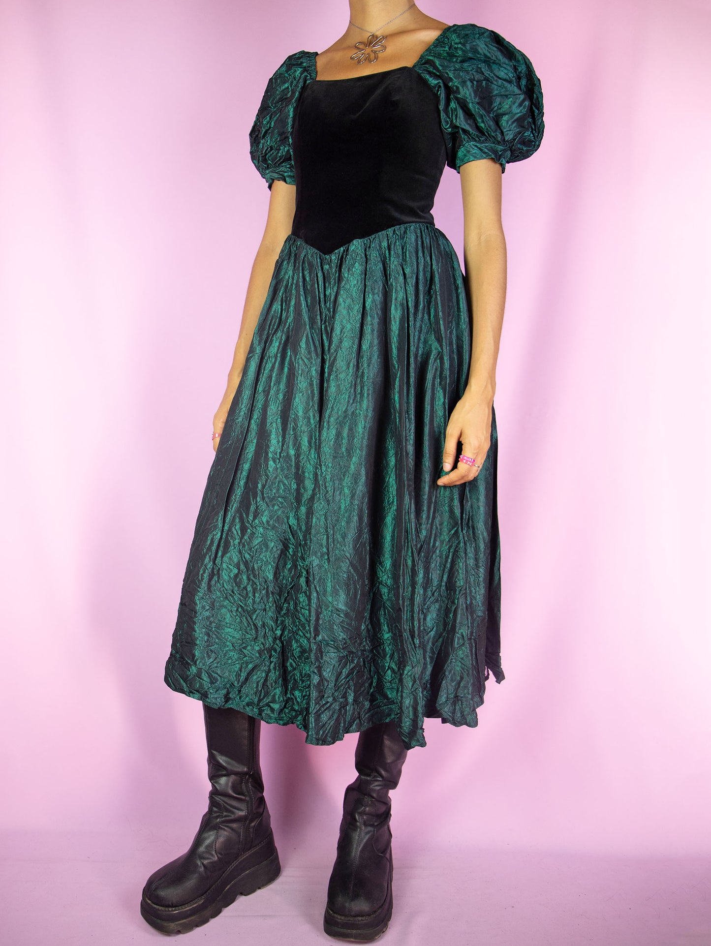 The Vintage 90s Puff Sleeve Midi Dress is an iridescent green flared dress with puff sleeves, black velvet front and back zipper closure. Cottage regency inspired 1990s dark romantic whimsygoth maxi dress.