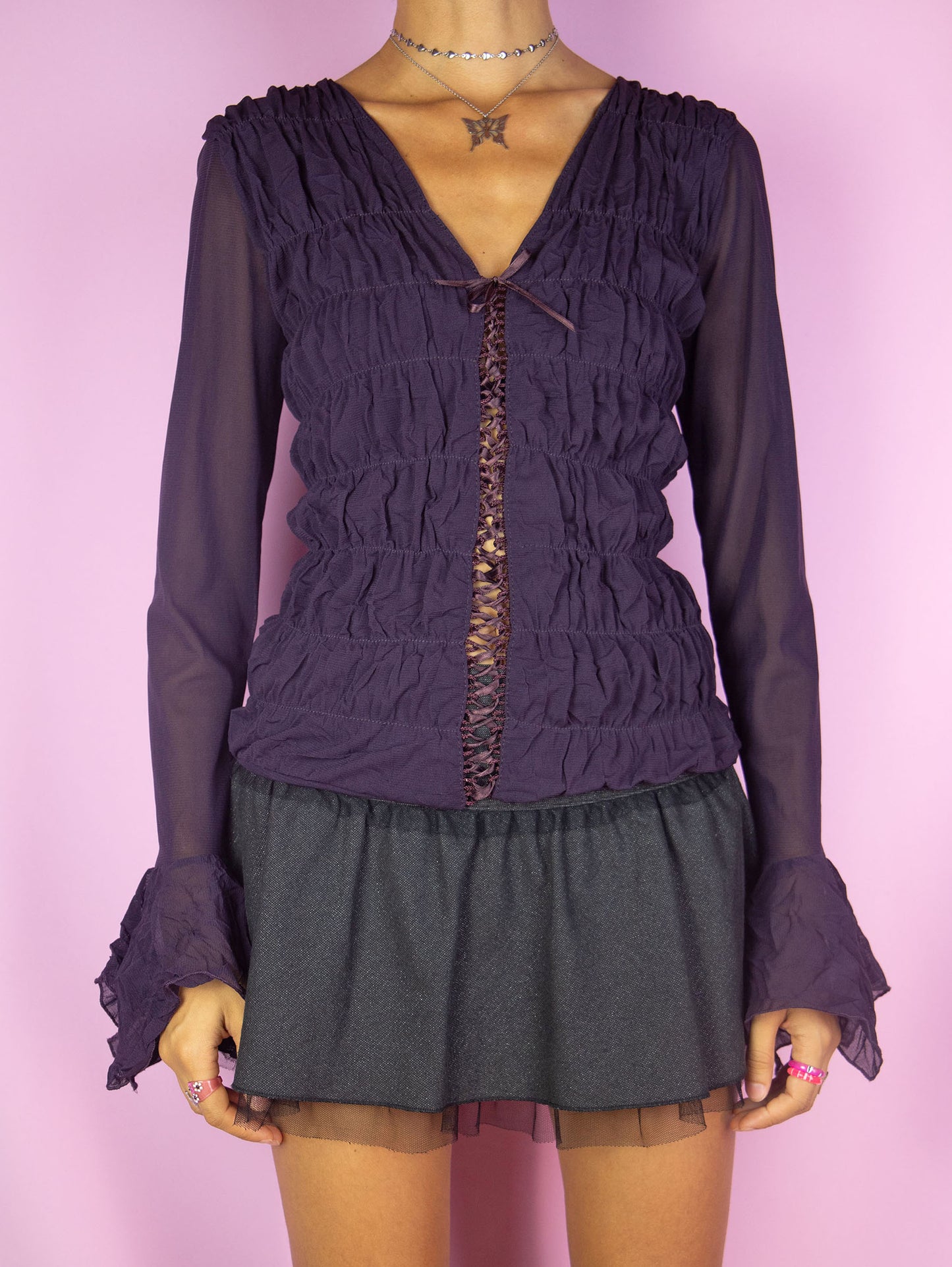 The Y2K Dark Purple Mesh Blouse is a vintage long bell sleeve ruched semi-sheer mesh dark purple top with lace-up front. Romantic fairy grunge whimsygoth 2000s shirt.