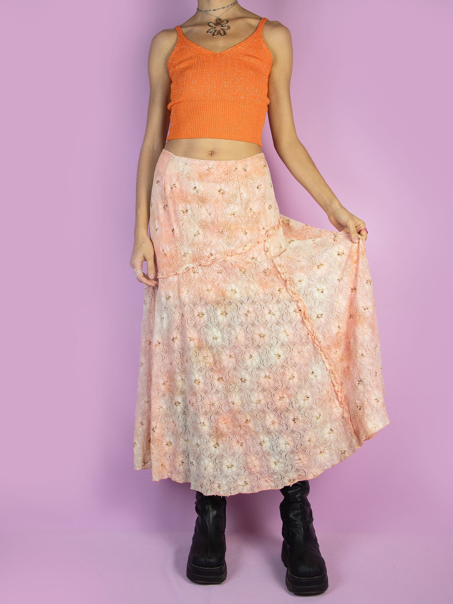 The Vintage 90s Fairy Lace Midi Skirt is a romantic summer party style pastel light orange and beige floral pattern mesh maxi skirt with glitter and ruffle details and a side zipper closure. Made in Spain.