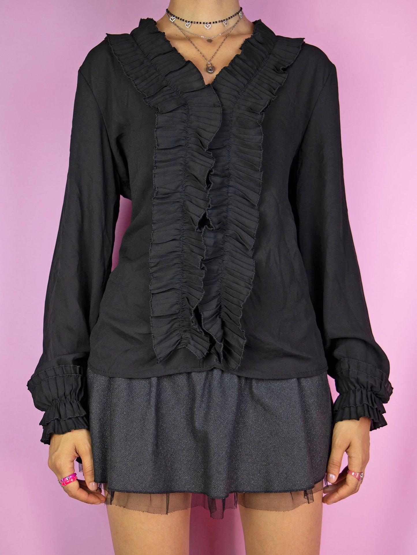 The Y2K Black Ruffle Blouse is a vintage 2000s romantic whimsygoth inspired semi-sheer balloon sleeve top.