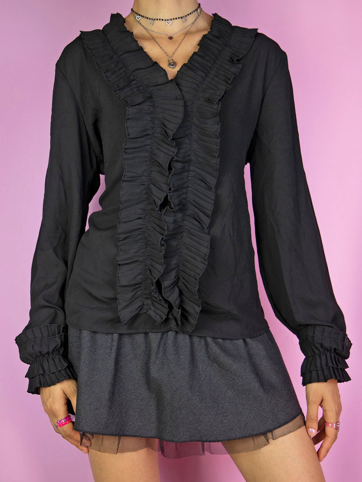 The Y2K Black Ruffle Frill Blouse is a vintage 2000s romantic whimsygoth inspired semi-sheer balloon sleeve top.