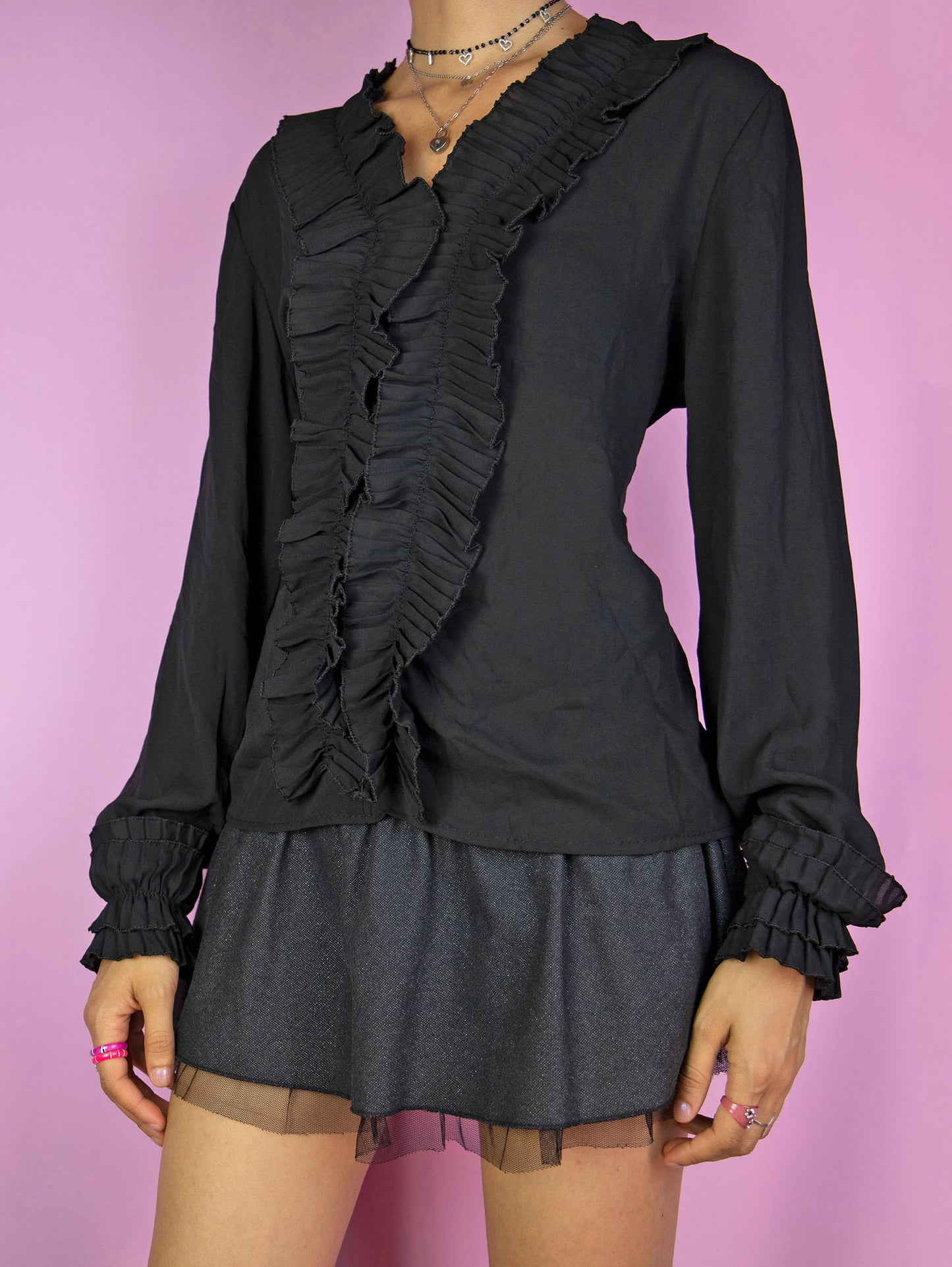 The Y2K Black Ruffle Blouse is a vintage 2000s romantic whimsygoth inspired semi-sheer balloon sleeve top.