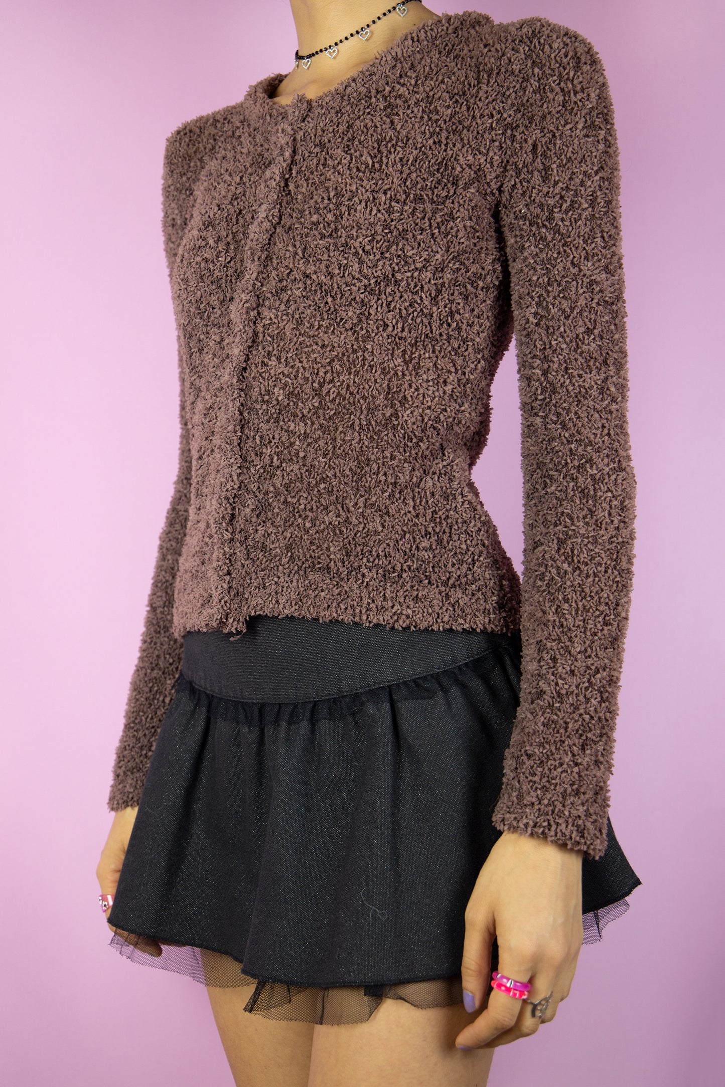 The Vintage 90s Brown Fairy Grunge Cardigan is a fuzzy knit cardigan with buttons. Boho 1990s sweater.