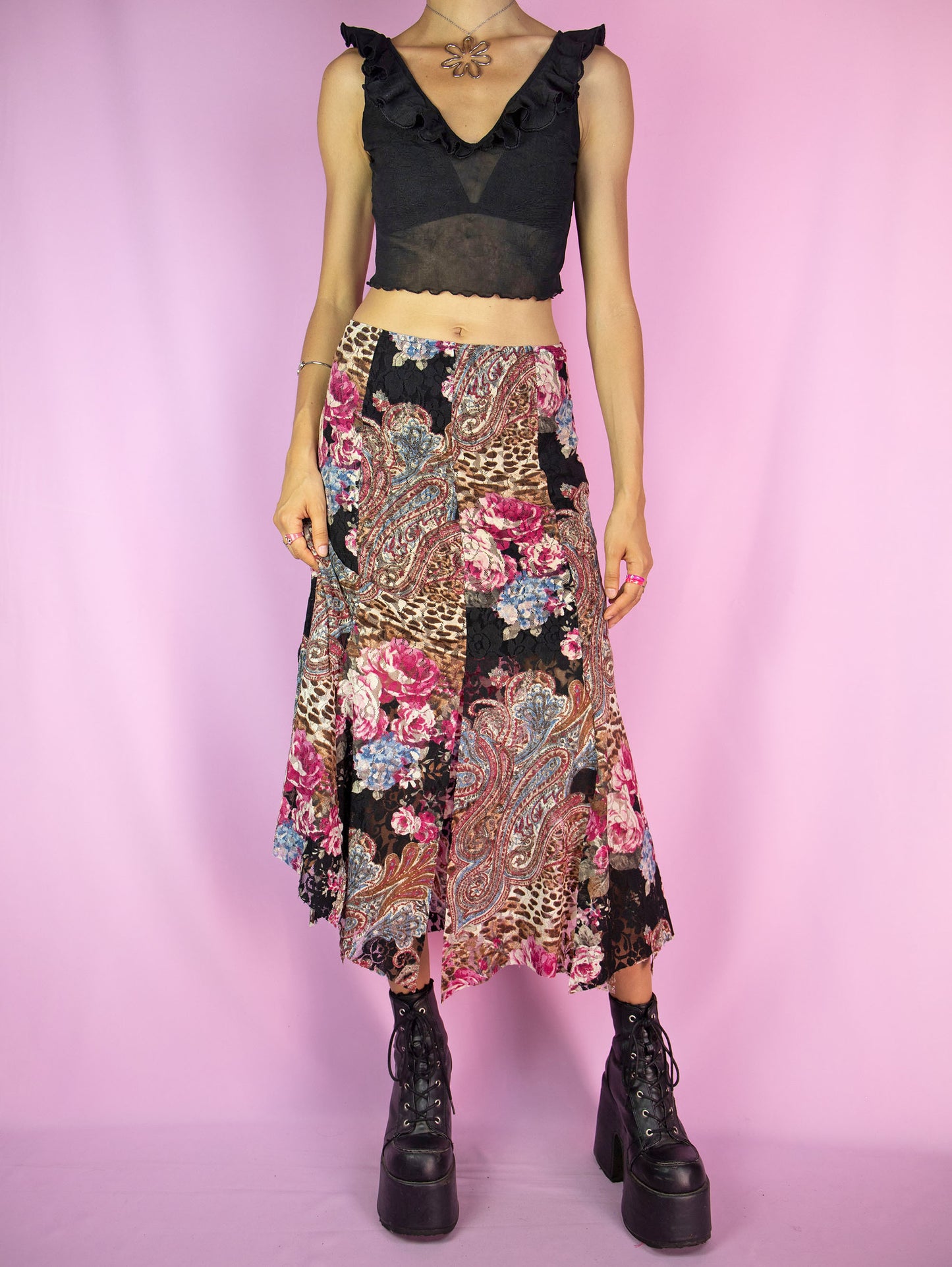 The Y2K Boho Lace Midi Skirt is a vintage floral abstract paisley animal print pattern mesh skirt with a spliced hem and an elasticated waist. Avant garde fairy grunge 2000s summer maxi skirt.