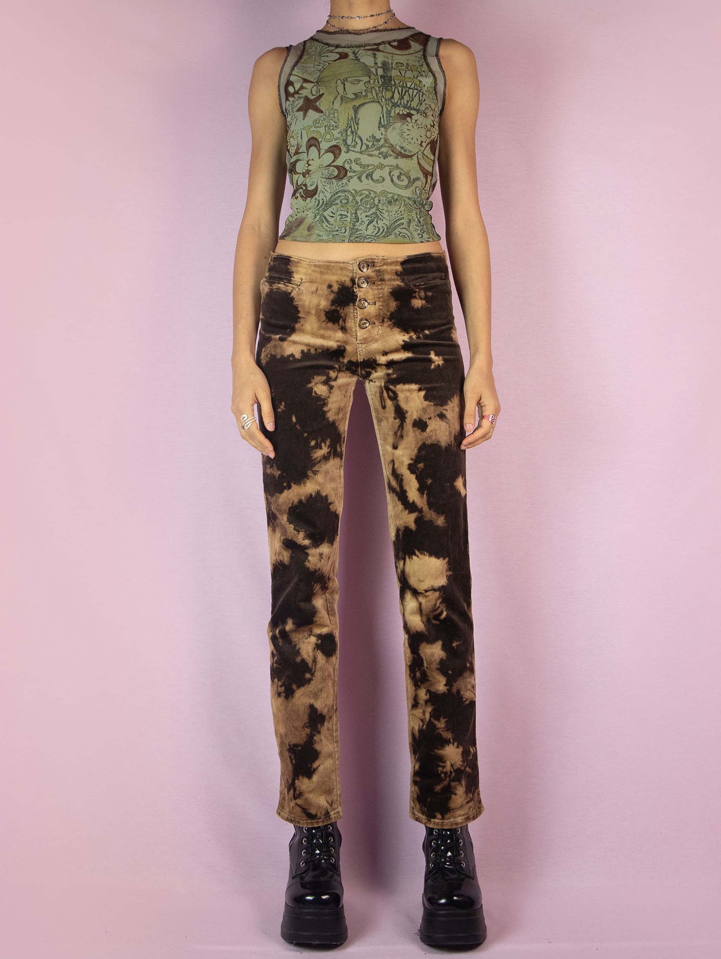 The Vintage 90s Brown Tie Dye Pants are low-rise straight-leg bleached-effect corduroy elastic festival grunge-style pants with button closure.