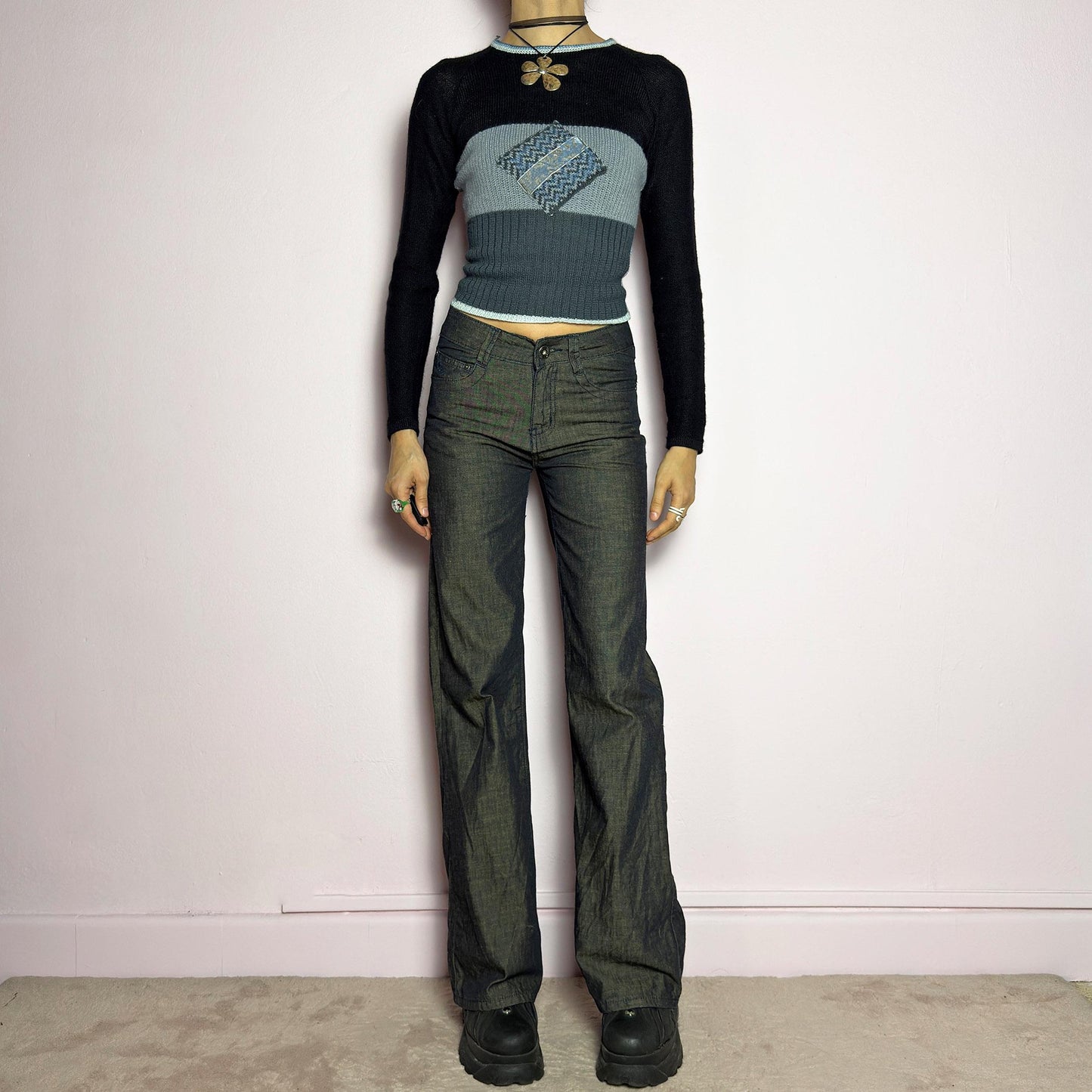 The Y2K Dark Rust Wide Jeans are a vintage 2000s statement piece featuring a structured denim fabric with a unique rust-effect wash, adding a worn-in, vintage appeal. Designed with a high-rise fit, button and zipper closure, and pockets, these jeans have a relaxed wide-leg silhouette that creates an effortlessly cool look. Perfect for edgy streetwear and casual outfits. adult world shop