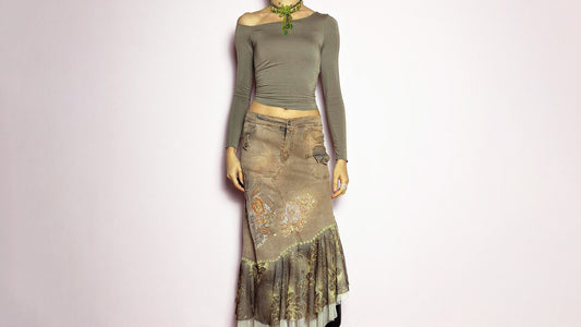 Vintage asymmetric denim midi skirt with gold embroidery and mesh ruffle hem, styled with black platform boots.