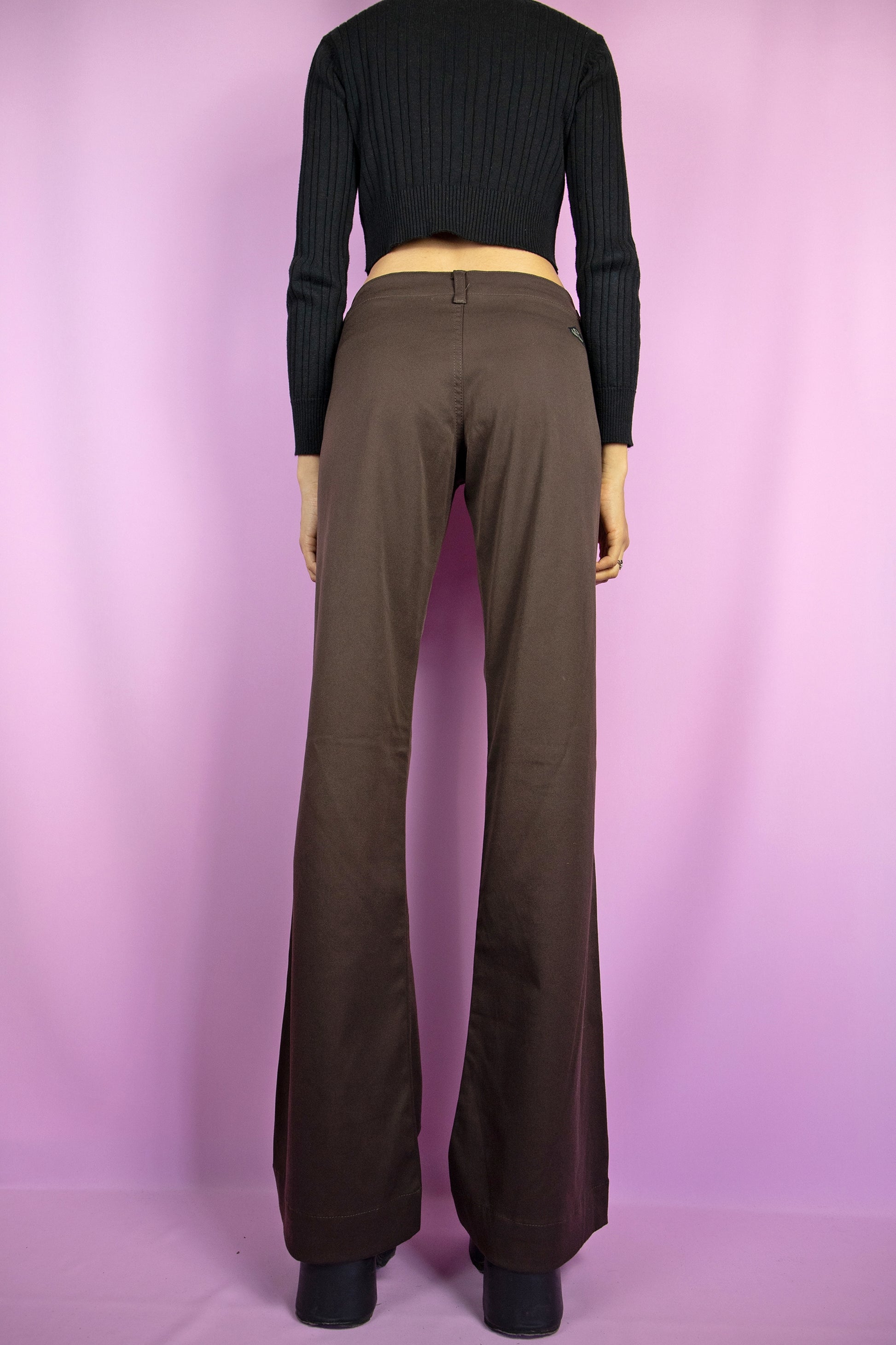 The Y2K Brown Flare Jeans are vintage mid-rise stretchy flare brown pants with pockets. Cyber grunge 2000s wide pants.