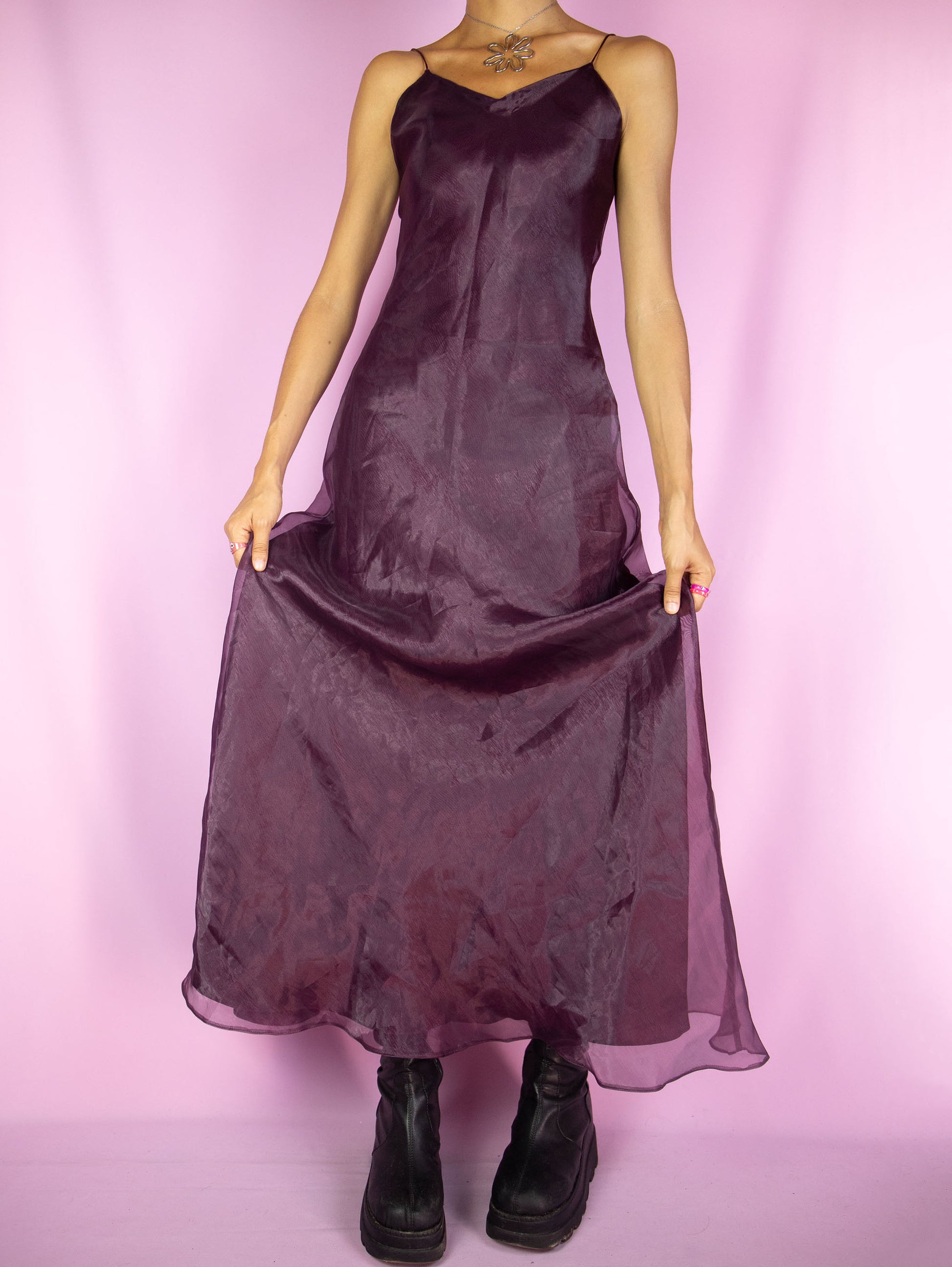 The Vintage 90s Dark Purple Maxi Dress is a purple sleeveless flared dress with spaghetti straps. Fairy grunge whimsygoth 1990s summer party night midi dress.
