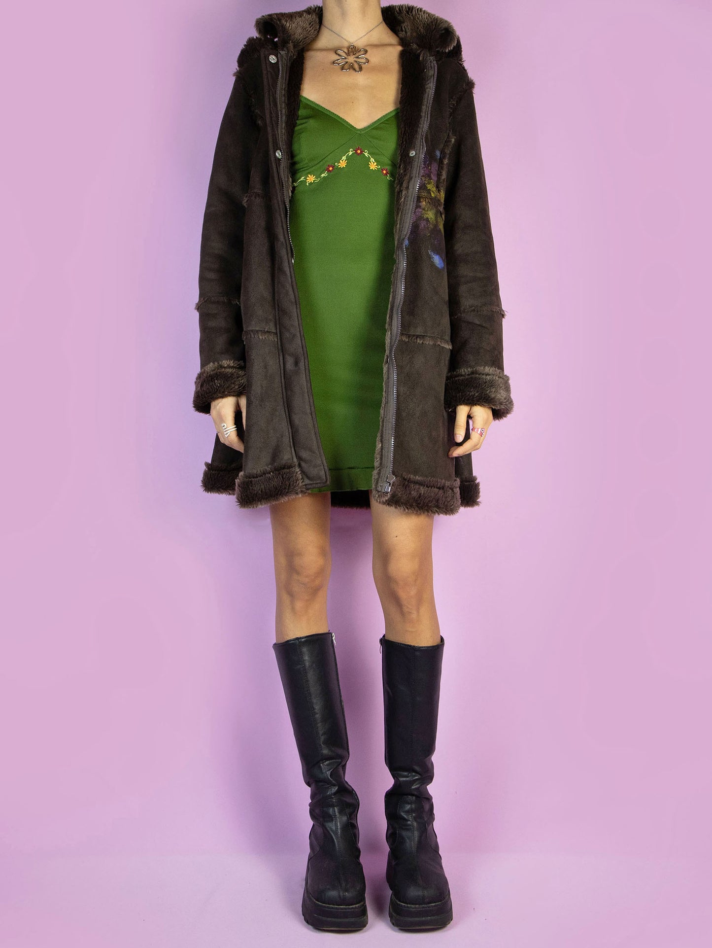 The Y2K Dark Brown Penny Lane Coat is a vintage faux suede coat with a collar, cuffs, and faux fur lining, zipper closure, and a hood. Fairy Grunge whimsygoth 2000s afghan-inspired winter statement jacket.