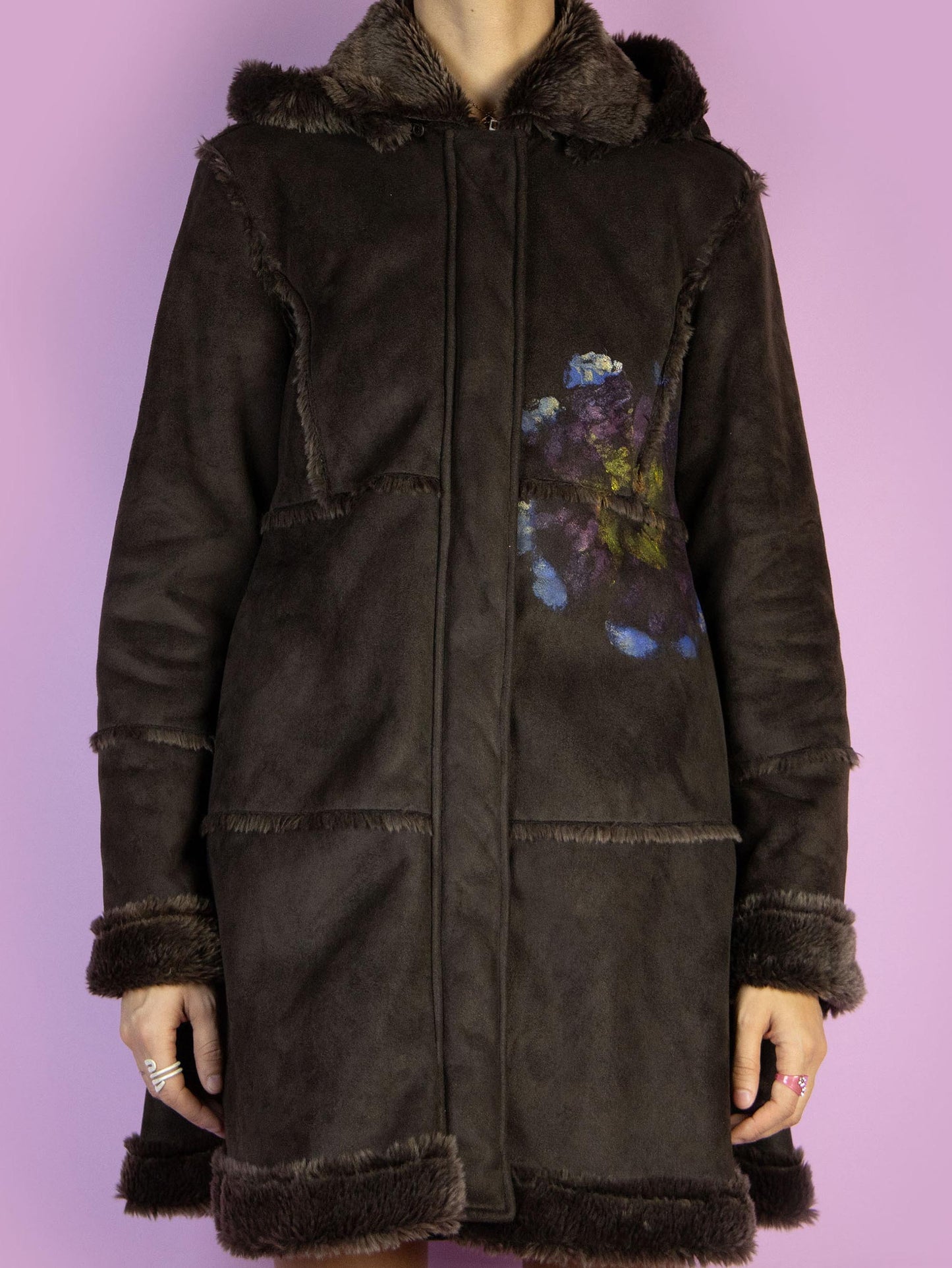 The Y2K Dark Brown Penny Lane Coat is a vintage faux suede coat with a collar, cuffs, and faux fur lining, zipper closure, and a hood. Fairy Grunge whimsygoth 2000s afghan-inspired winter statement jacket.