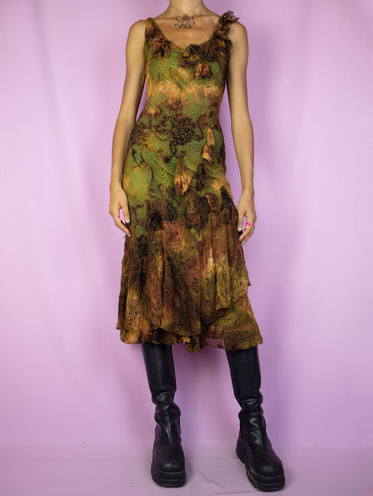 The Y2K Fairy Brown Midi Dress is a vintage sleeveless crochet-style mesh dress with a tie-dye pattern and a green lining. It features a layered ruffled hem, and a charming asymmetric design. Romantic avant-garde 2000s evening party dress.