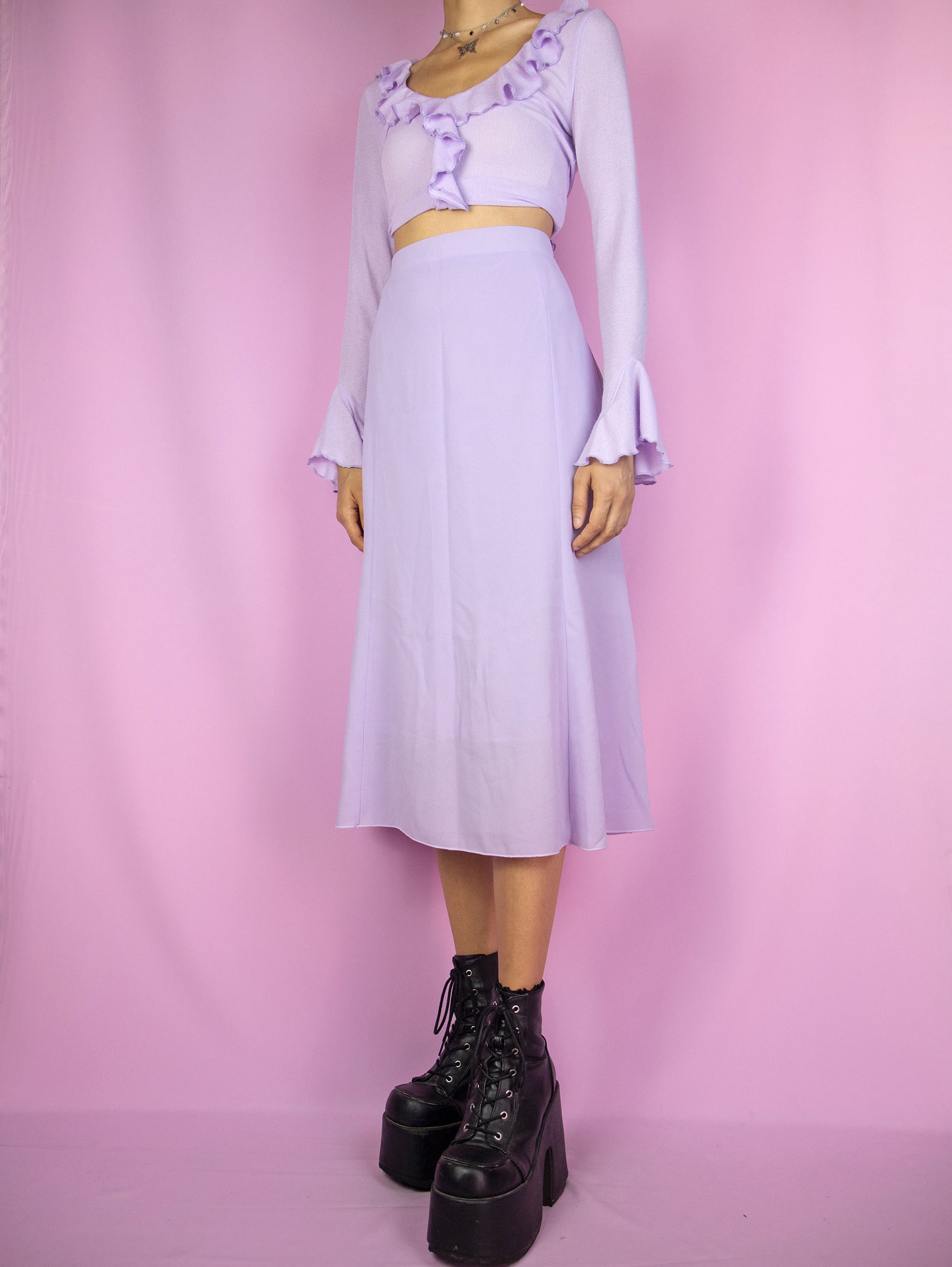 The Y2K Purple Trumpet Midi Skirt is a vintage 2000s boho summer pastel light lilac skirt with side zipper closure.
