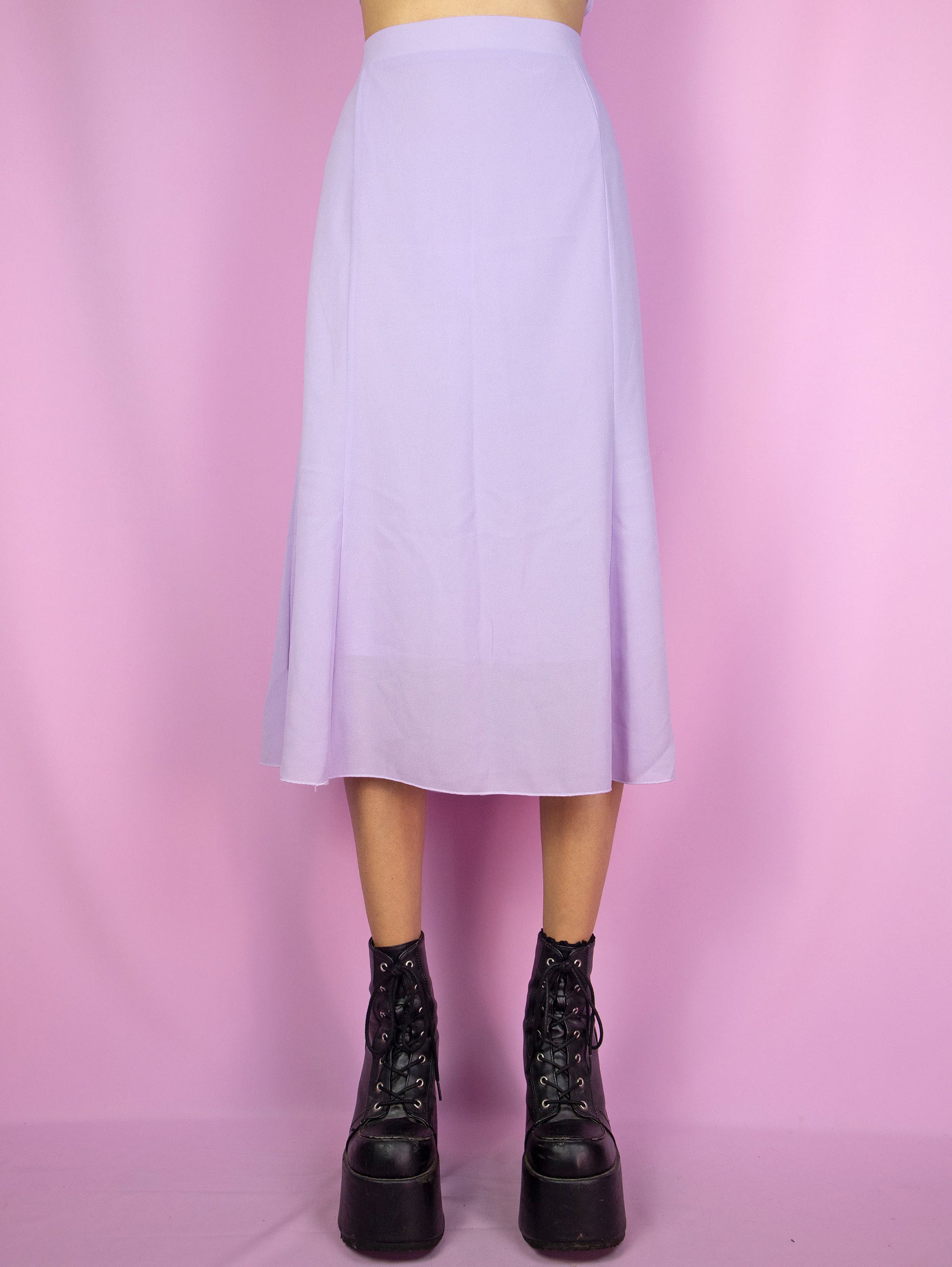 The Y2K Purple Trumpet Midi Skirt is a vintage 2000s boho summer pastel light lilac skirt with side zipper closure.