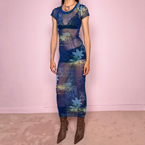Vintage 2000s Kenzo Jeans sheer mesh maxi dress in a striking dark blue abstract patchwork print with floral and graphic details throughout. Designed in a fitted long silhouette with short sleeves, a round neckline, and lightweight semi-sheer fabric. A bold 90s/early Y2K designer piece with a futuristic avant-garde aesthetic, perfect for an editorial look.