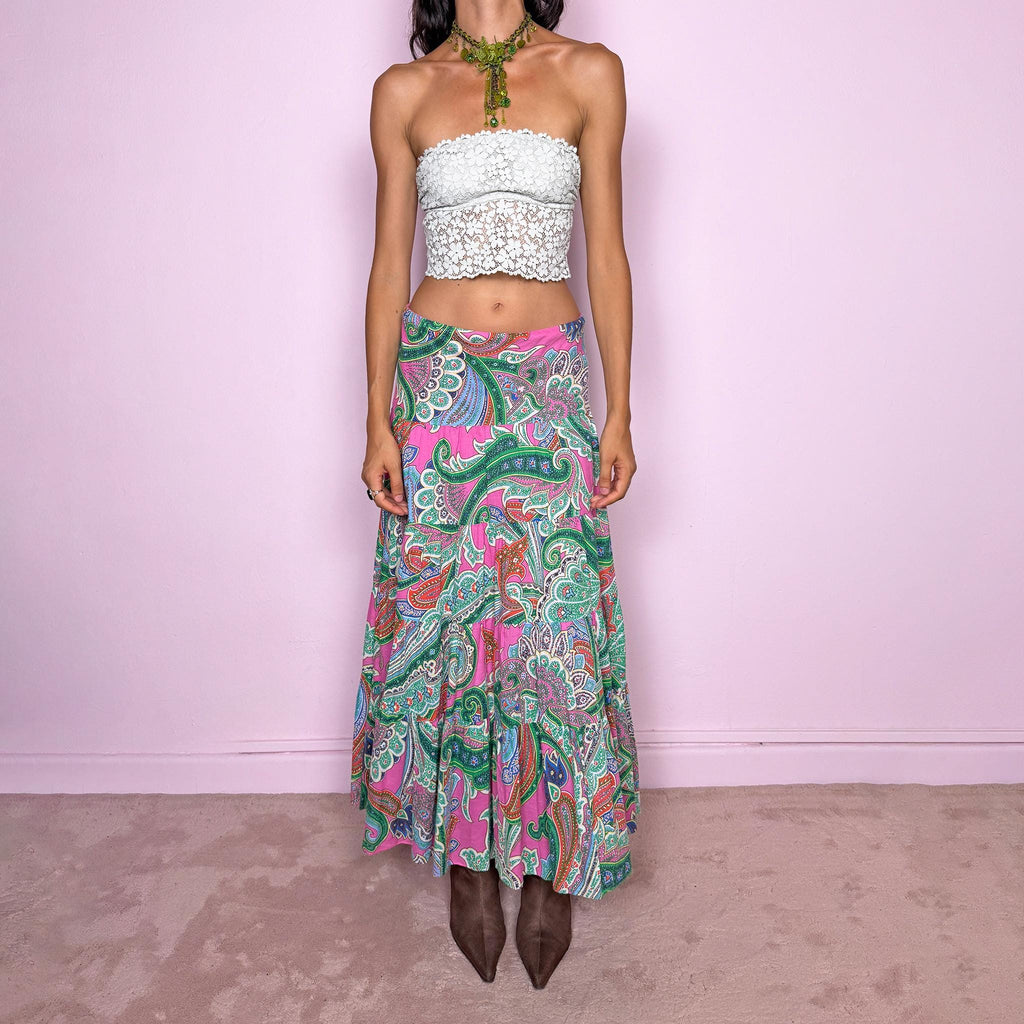 Vintage 2000s bohemian paisley maxi skirt, crafted from 100% cotton with a 100% cotton lining. Features a vibrant all-over paisley print in pink, green, blue, and orange tones, a softly flared tiered silhouette, and an elasticated waist. Can be worn mid- to low-rise for size S. By American brand Lauren Ralph Lauren. Excellent vintage condition.