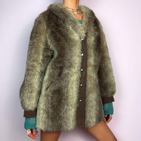 The Vintage 90s Plush Faux Fur Coat is a statement outerwear piece exuding warmth and glamour. This coat features a plush faux fur texture in earthy tones, creating a cozy look. Designed with a snap button-front closure. adult world shop
