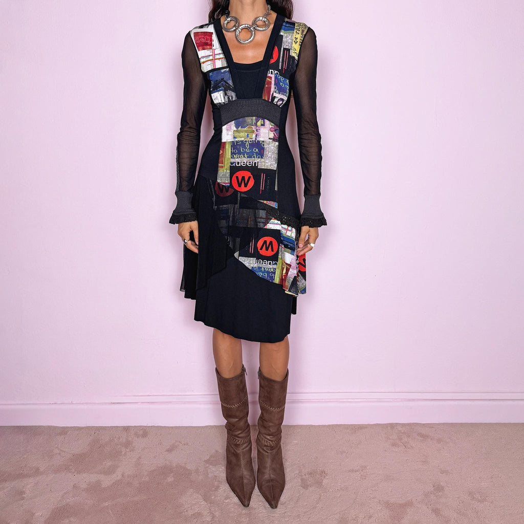 Vintage 2000s black midi dress featuring a stretchy fitted base with semi-sheer long sleeves and a layered deconstructed graphic construction through the front. Designed with an asymmetric mix of collage-style printed panels, text and bold multicolor motifs, plus contrasting ribbed sections and ruffled cuff details. The combination of sheer fabric, irregular paneling and graphic artwork gives it an avant-garde Y2K art-to-wear look.