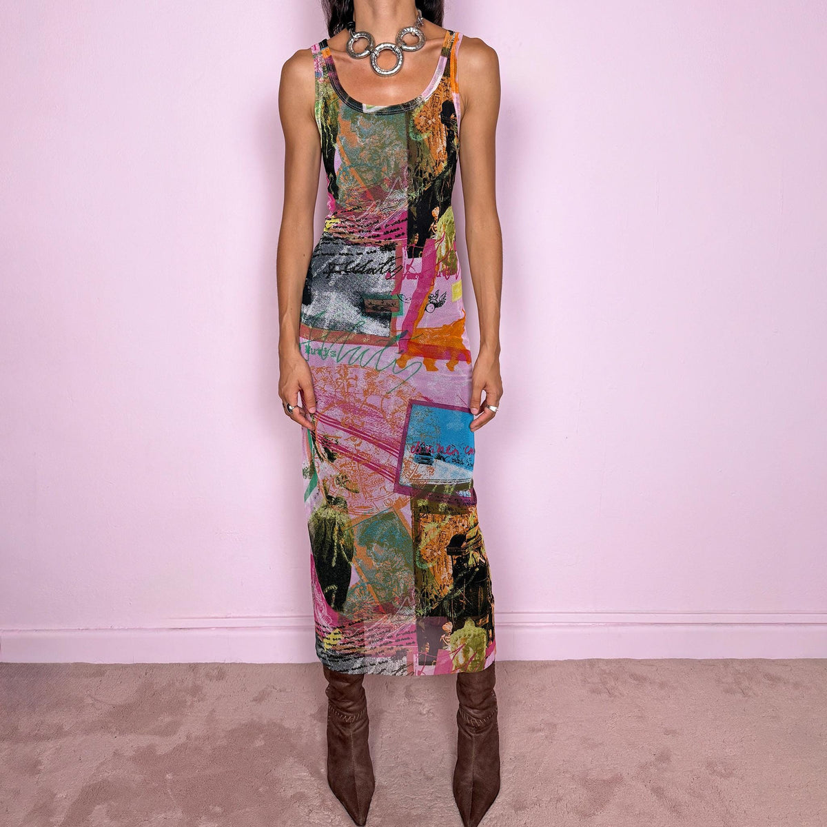 Vintage 2000s fitted mesh midi dress. Featuring a body-skimming sleeveless silhouette with a scoop neckline and a bold maximalist art graphic print in pink, orange, green, blue, and black tones. The lightweight semi-sheer mesh and collage-inspired print give it a distinctly Y2K art-to-wear feel with an avant-garde edge. It has a brown lining. From a French brand, made in France from a stretchy polyamide and polyester blend. Excellent vintage condition.