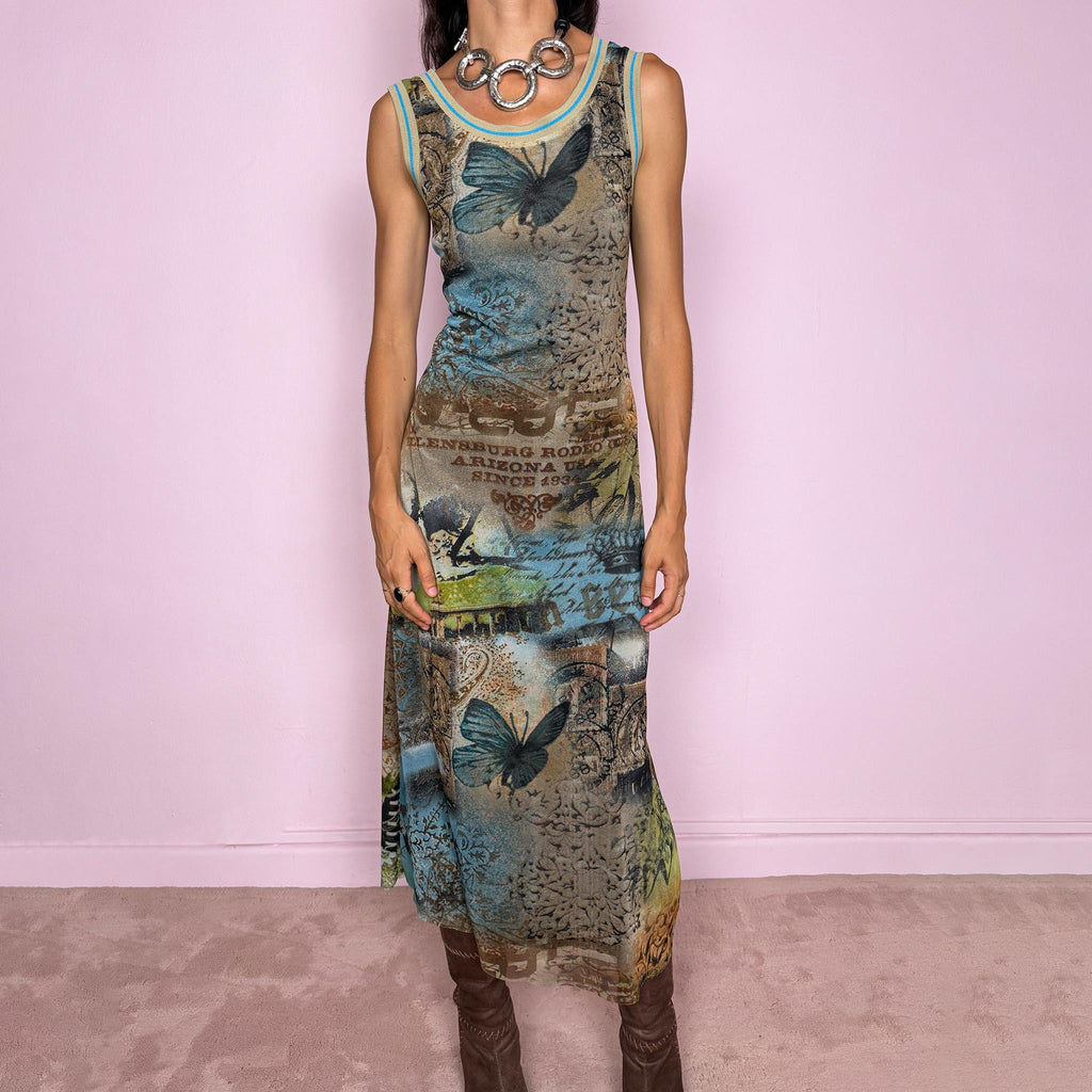 Vintage 2000s fitted sleeveless midi dress in lightweight stretch mesh with matching mesh lining for a softly sheer layered effect. Features blue, green and brown butterfly graphics, faded architectural motifs, postcard-style typography and contrast trim, with a visual Y2K art-to-wear feel for maximalist editorial styling. Made in France by a French brand. Excellent vintage condition.