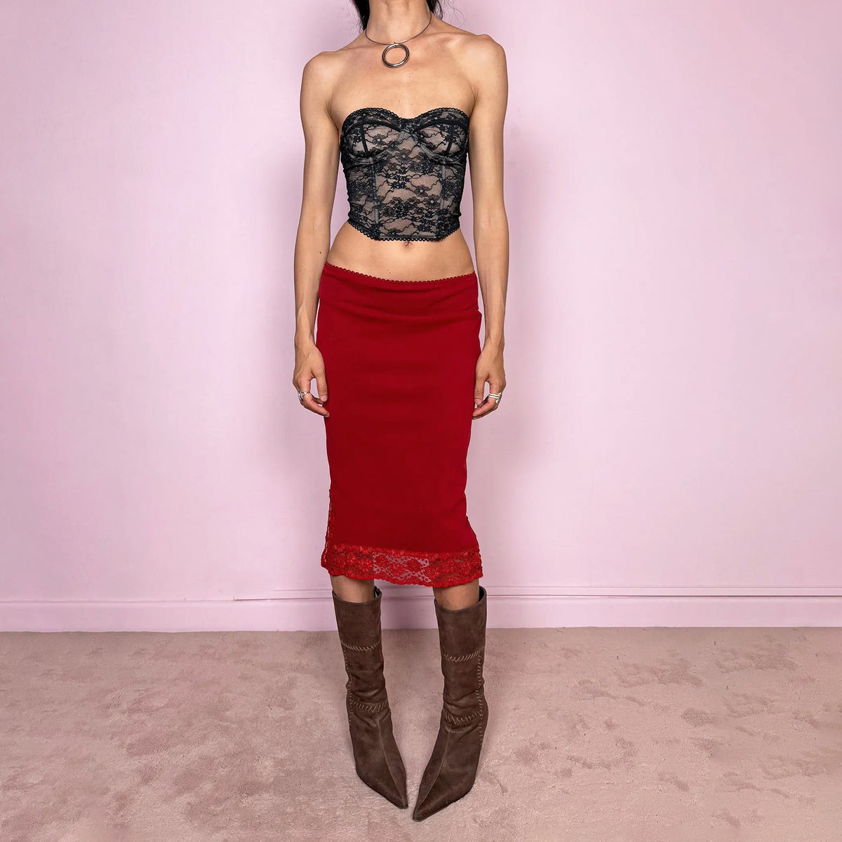 Vintage 2000s elegant feminine red mesh midi skirt featuring side slits, an elastic waist, and a lace-trim hem. Can be worn mid- to low-rise for sizes S and XS. From a French brand. Made in France from 100% polyamide with a 100% polyester lining. Excellent vintage condition.
