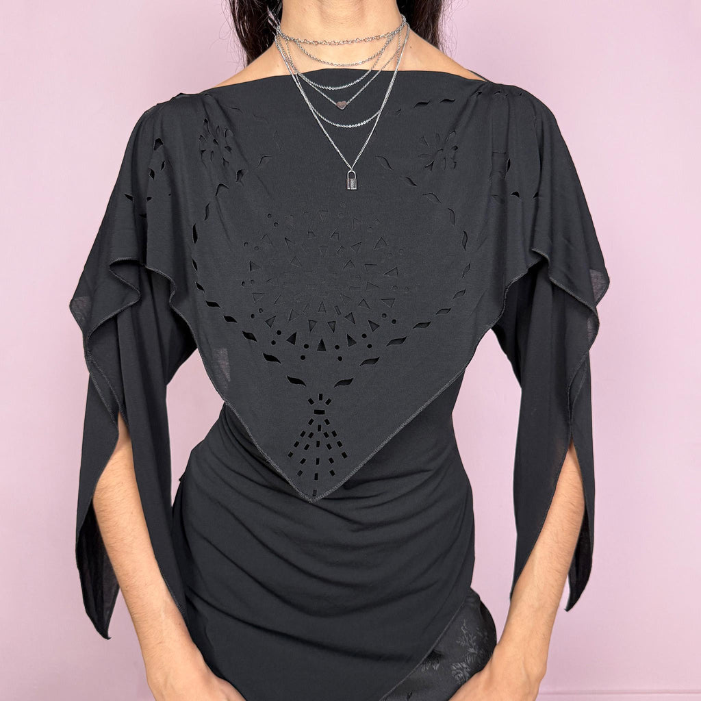 Vintage 2000s dark avant garde fitted top with a boat neckline and dramatic split sleeves. Features a layered deconstructed design with cut out detailing, asymmetric pointed hem, and fluid draped panels. Stretchy and sculpting silhouette. Made in France by a French brand from an acetate, elastane, and polyamide blend. Unique statement piece. Excellent vintage condition.