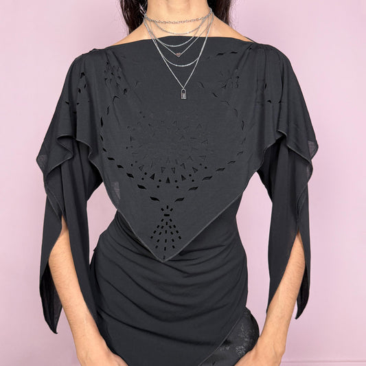 Vintage 2000s dark avant garde fitted top with a boat neckline and dramatic split sleeves. Features a layered deconstructed design with cut out detailing, asymmetric pointed hem, and fluid draped panels. Stretchy and sculpting silhouette. Made in France by a French brand from an acetate, elastane, and polyamide blend. Unique statement piece. Excellent vintage condition.