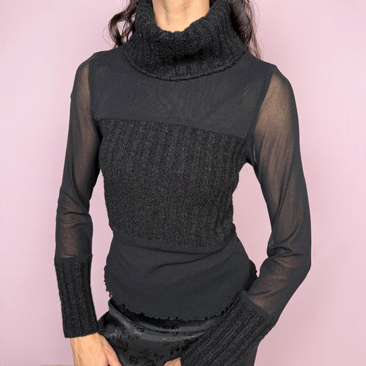 Avant garde minimalist vintage 2000s black deconstructed long sleeve top featuring a knit turtleneck, ribbed knitted cuffs, and patchwork construction with mesh and semi-sheer panels. Designed for futuristic dystopian weird girl aesthetic layering with a fitted silhouette. Stretchy polyamide fabric. Made in Italy. Great vintage condition.