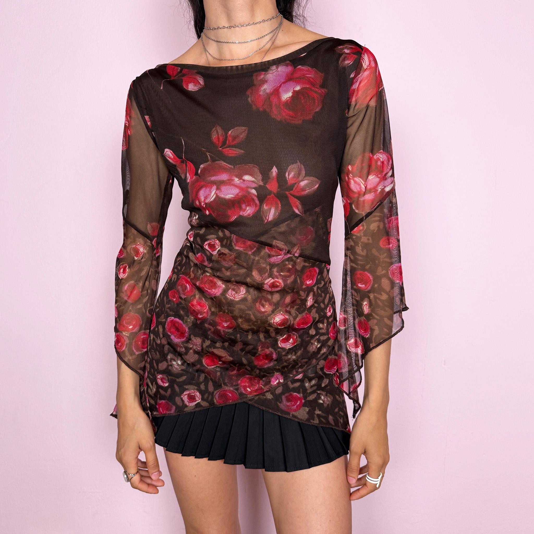 Vintage 2000s brown sheer mesh top with a fitted stretchy silhouette, asymmetric draped layered construction, wide boat neckline, and 3/4 bell sleeves. Red and pink floral rose print gives a romantic fairycore Y2K statement look. From a French brand. Fabric composition label is missing. Excellent vintage condition.