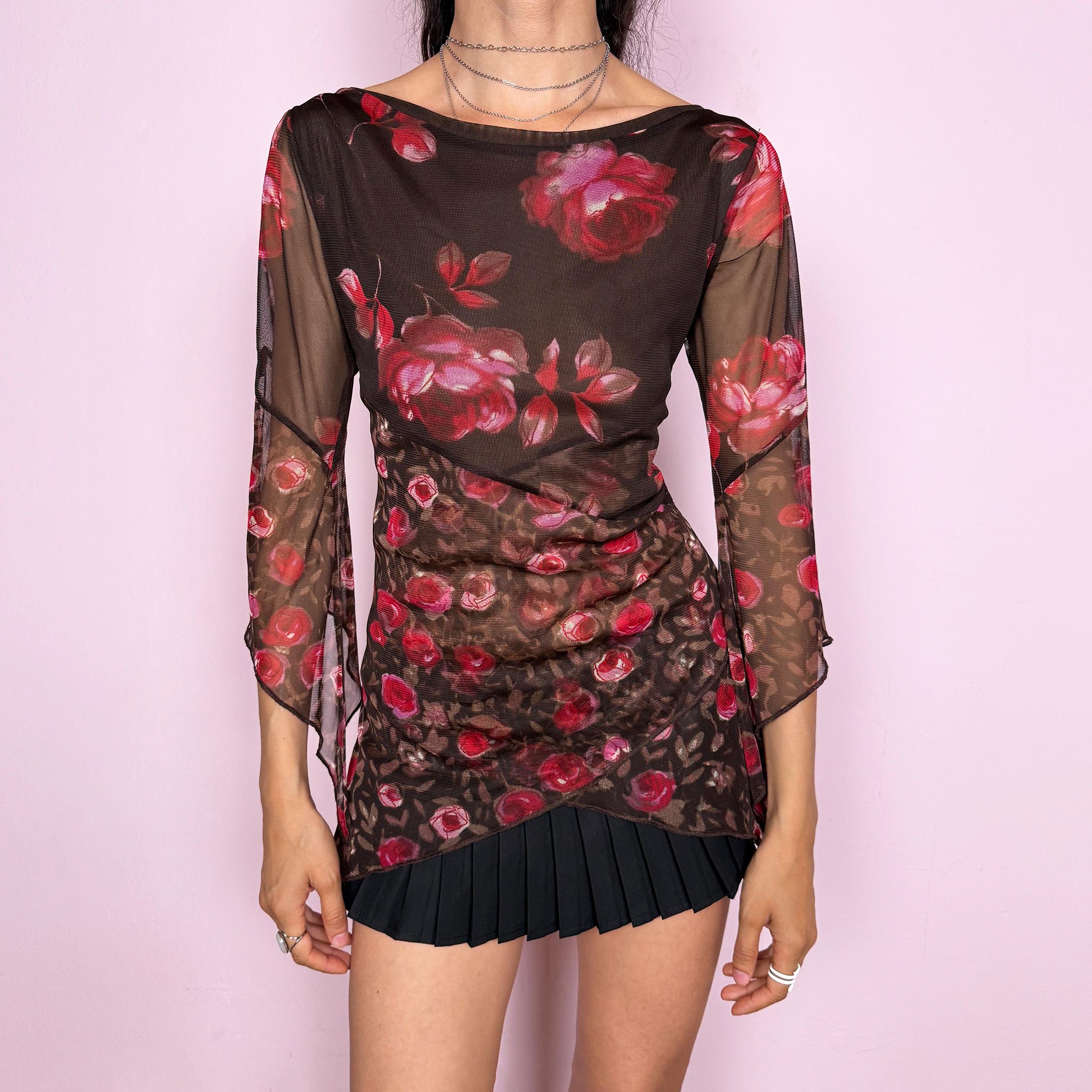 Vintage 2000s brown sheer mesh top with a fitted stretchy silhouette, asymmetric draped layered construction, wide boat neckline, and 3/4 bell sleeves. Red and pink floral rose print gives a romantic fairycore Y2K statement look. From a French brand. Fabric composition label is missing. Excellent vintage condition.