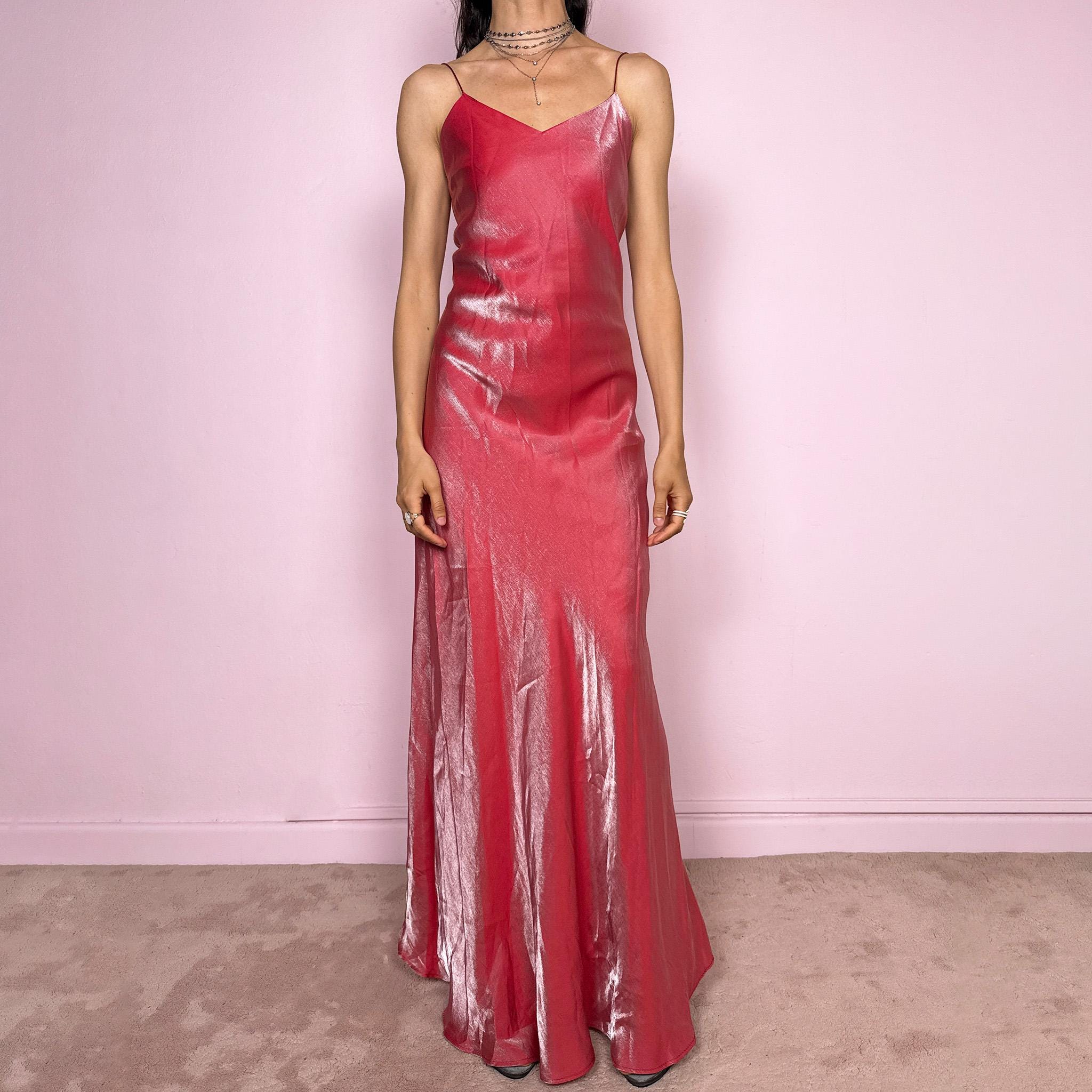 Vintage 2000s feminine dreamy coral maxi dress with an iridescent shiny finish. Elegant slip silhouette with V neckline, delicate spaghetti straps and fluid floor-length drape that moves beautifully. Perfect for formal parties, galas, weddings or special events. Made in France from 100% polyester. Excellent vintage condition.