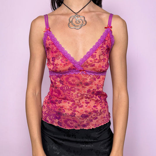 Vintage Y2K coral and purple floral mesh cami top from the 2000s with a dreamy coquette feel. Features adjustable straps, lace trim, ribbon details, and a fitted lingerie-inspired silhouette. Stretchy and lightweight, perfect for summer nights out, Y2K parties and lounge styling. Made from stretch mesh. Great vintage condition.