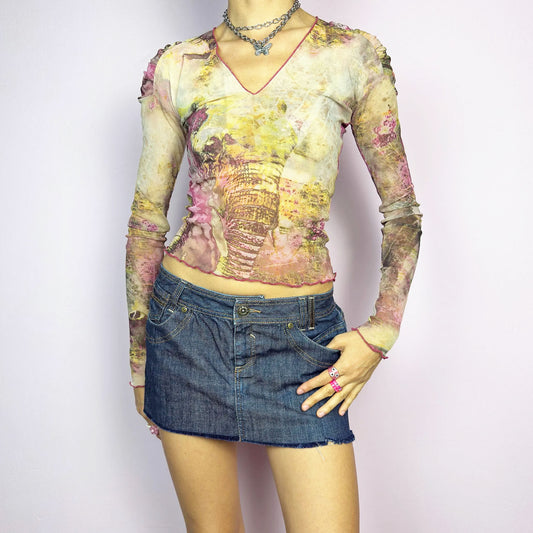The Y2K Dark Denim Low Rise Mini Skirt is a vintage 2000s staple, featuring a short micro fit with a low-rise waist and a raw hem for an effortlessly edgy look. Crafted from dark-wash denim with contrast stitching, this micro mini skirt has a zipper and button closure along with classic five-pocket detailing. Perfect for casual, grunge, or festival outfits.