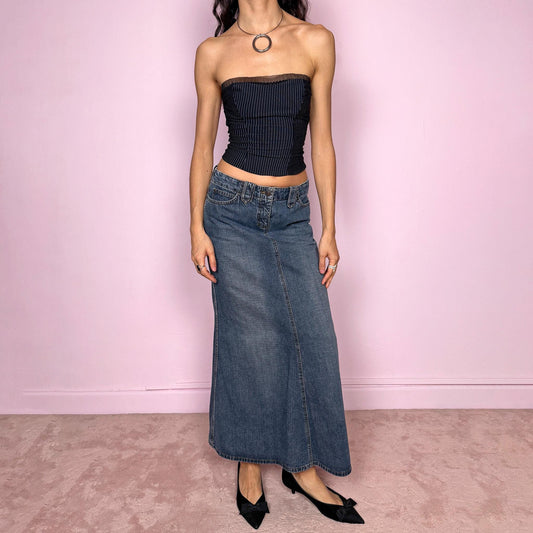 Vintage 2000s blue denim maxi skirt with a flared silhouette, classic five-pocket design, and front zip closure. Structured cotton denim with no stretch. Unique statement streetwear piece. Can be worn high waisted for size S or mid to low rise for size XS/XXS. Made from 100% cotton. Excellent vintage condition.