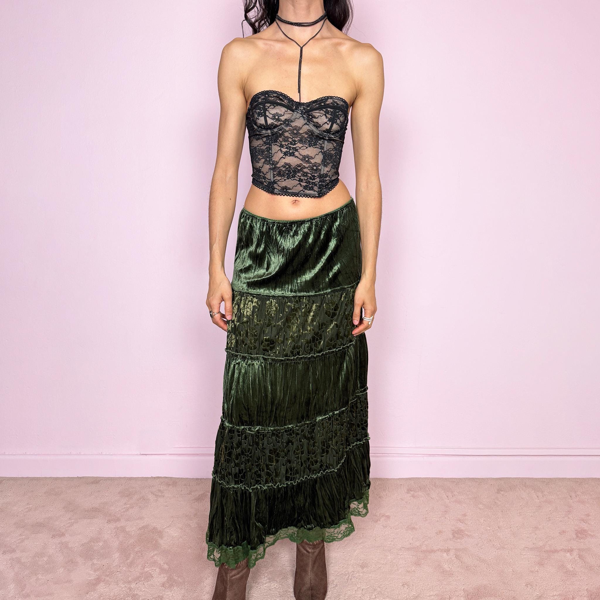 Vintage 2000s green velvet midi skirt with a whimsical fairycore boho feel. Features a tiered construction with burnout mesh floral panels and a soft crinkled texture. Stretchy elastic waistband for flexible fit. Can be worn high waisted for size M or lower for size S. Made by a French brand from polyester. Excellent vintage condition.