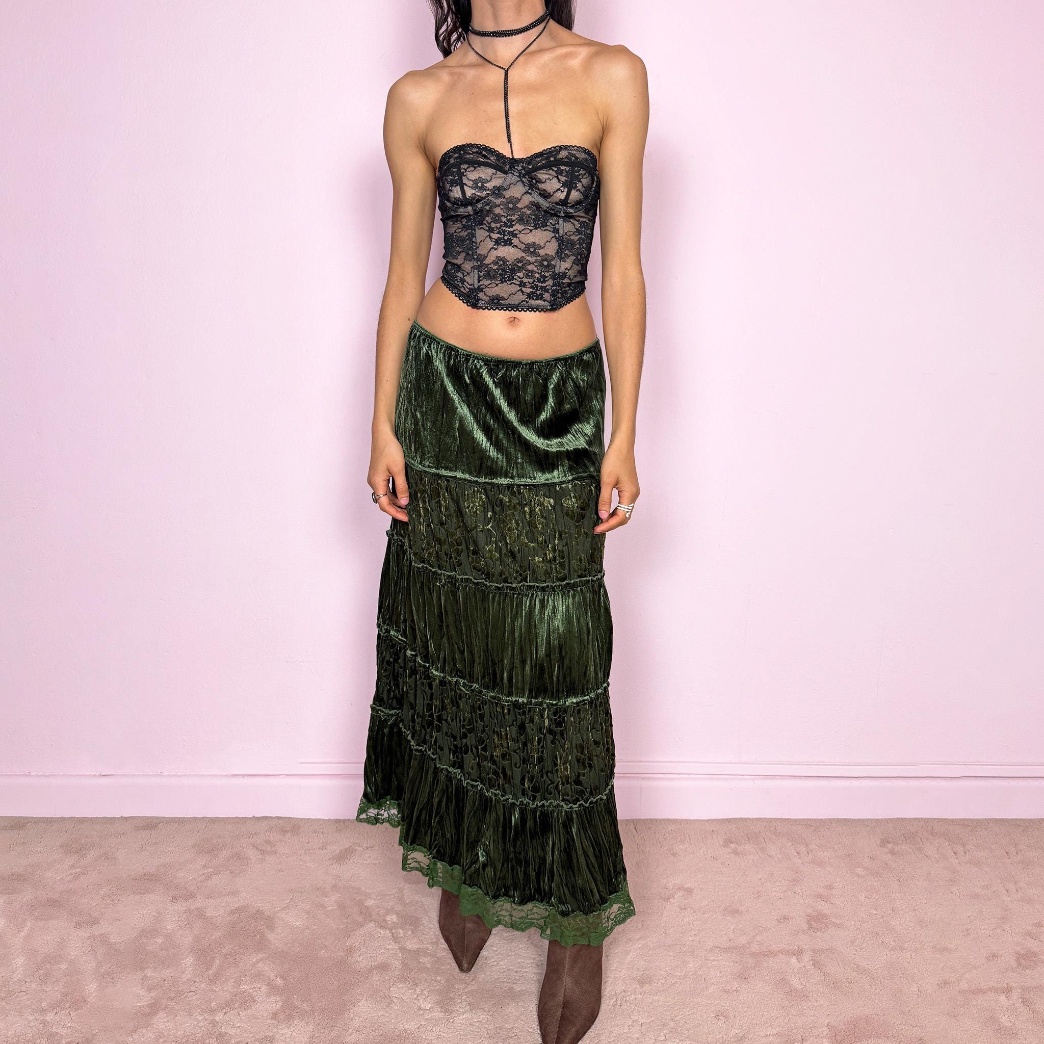 Vintage 2000s green velvet midi skirt with a whimsical fairycore boho feel. Features a tiered construction with burnout mesh floral panels and a soft crinkled texture. Stretchy elastic waistband for flexible fit. Can be worn high waisted for size M or lower for size S. Made by a French brand from polyester. Excellent vintage condition.