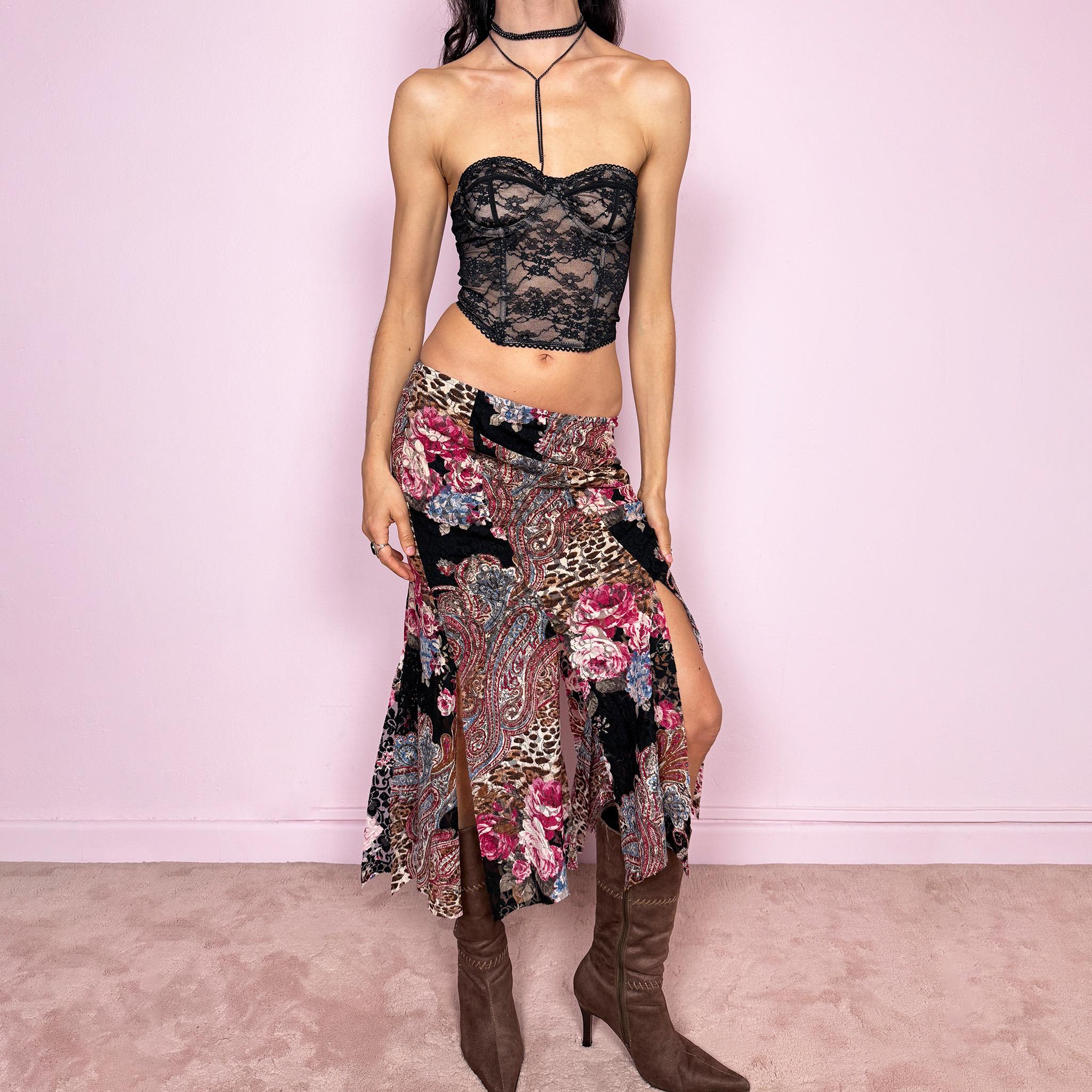 Vintage 2000s lace midi skirt with a whimsical maximalist mix of floral, paisley, and animal prints. Features multiple split hems and a stretchy elastic waistband for a flexible fit. Can be worn high waisted for size S or mid to low rise for XS. Made from a microfiber blend. Great vintage condition.