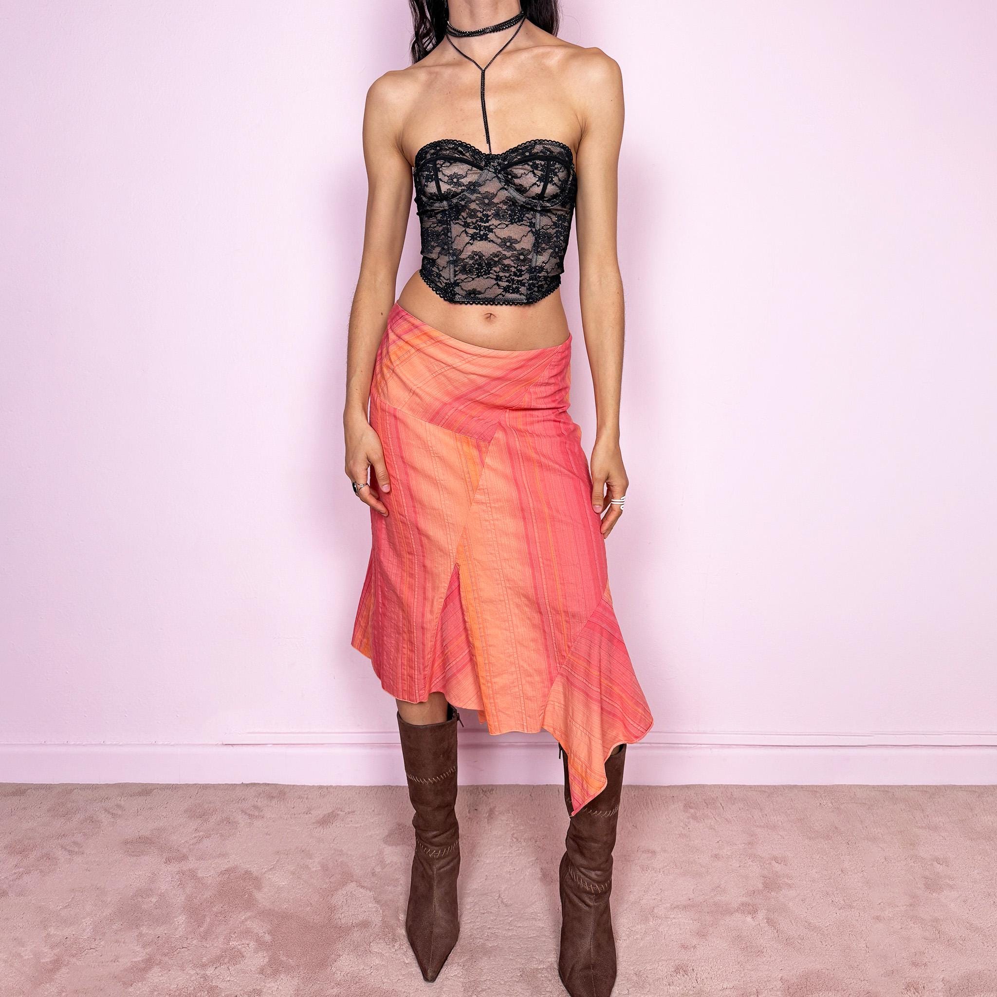 Vintage 2000s summer fairycore midi skirt in orange and coral tones with a colorful maximalist patchwork and striped design. Features an asymmetric hem with paneling and a side zip closure, no stretch. Can be worn high waisted for size L or mid rise for size M. Lightweight and flowy silhouette. Great vintage condition.