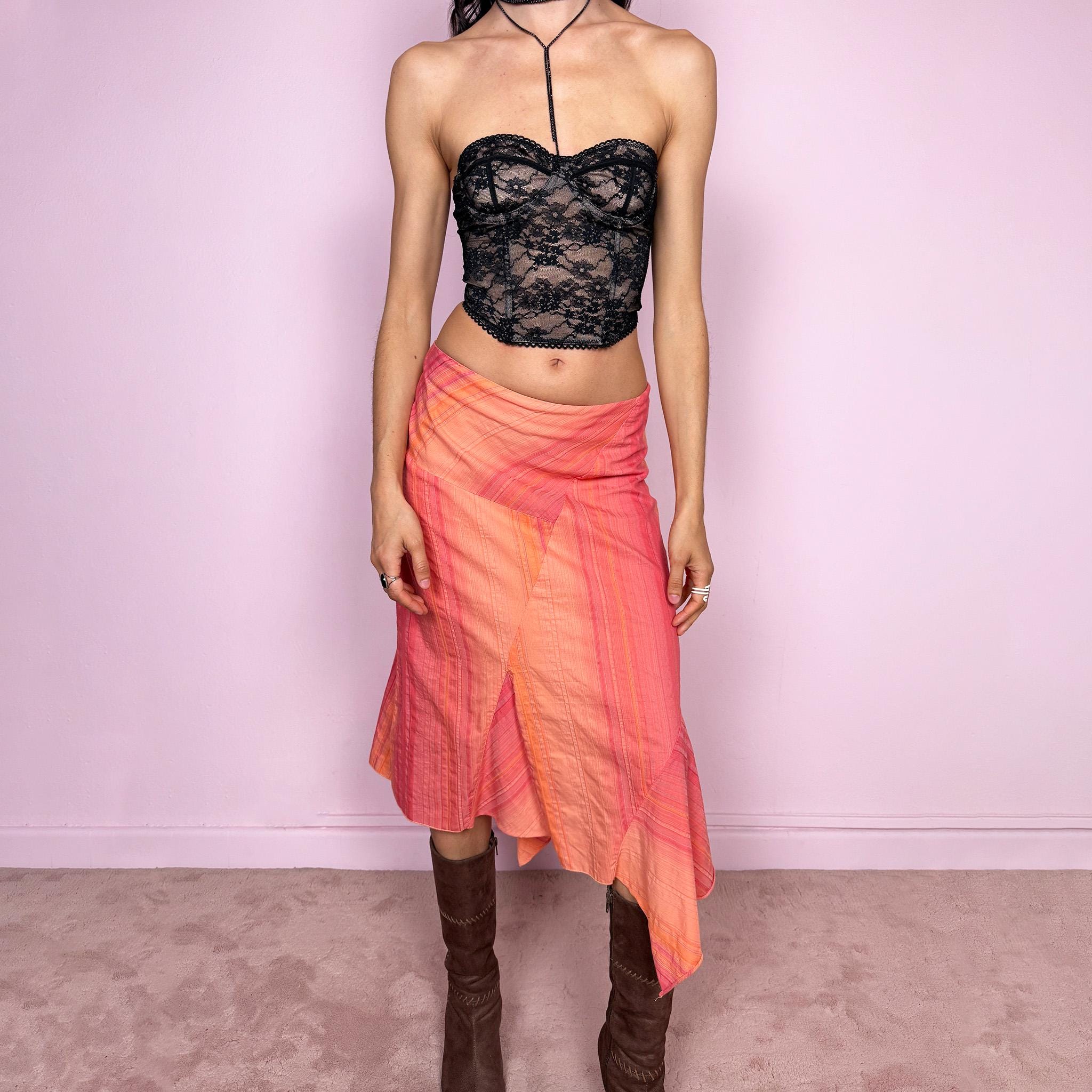 Vintage 2000s summer fairycore midi skirt in orange and coral tones with a colorful maximalist patchwork and striped design. Features an asymmetric hem with paneling and a side zip closure, no stretch. Can be worn high waisted for size L or mid rise for size M. Lightweight and flowy silhouette. Great vintage condition.