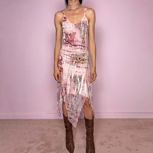 Vintage 2000s slip dress with thin straps, a fitted body-skimming silhouette, pink and burgundy abstract bohemian print over a white crinkle-textured base, semi-sheer lightweight fabric and a dramatic asymmetric handkerchief hem. Dreamy fairy grunge Y2K statement dress with a romantic summer feel. Made in France from a polyester-elastane blend. Excellent vintage condition.
