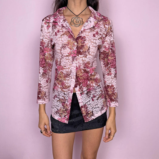 Vintage 2000s romantic feminine blouse in pink and burgundy floral lace mesh. Semi-sheer fabric with 3/4 sleeves, classic collar, and full buttoned front. Lightweight fitted silhouette, perfect for summer fairycore, coquette styling, or a spring picnic look. Made by a French brand from a stretchy polyester-elastane blend. Excellent vintage condition.