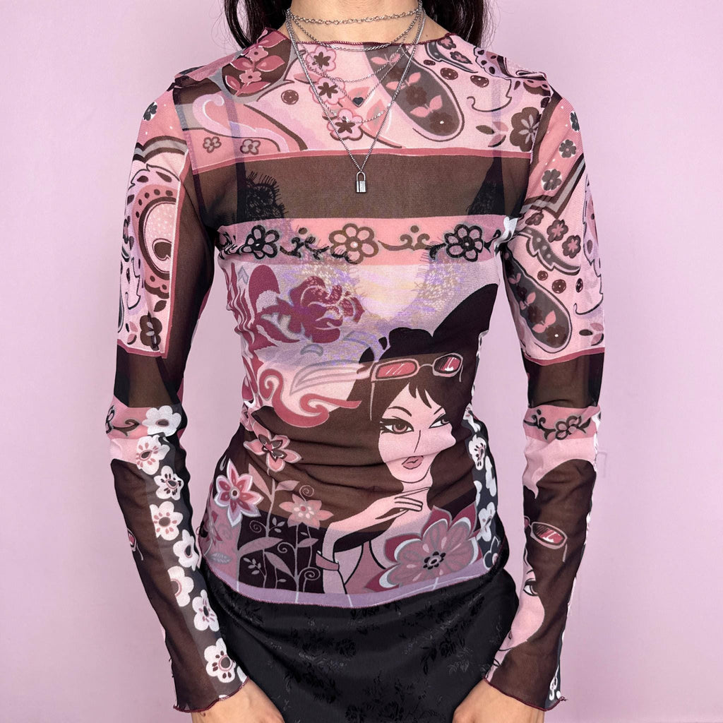 Vintage 2000s maximalist pink burgundy abstract floral graphic print mesh long sleeve semi sheer fitted stretchy top featuring a woman face motif. Lightweight with a bold statement design, perfect for spring or summer layering. Made in France from polyamide. Excellent vintage condition.
