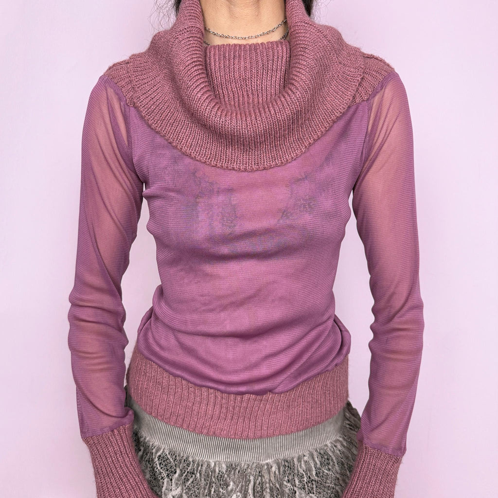 Vintage 2000s semi-sheer muted pink bimaterial top made in Italy with a soft stretchy mesh body and sleeves, ribbed knit trims, long fitted cuffs, and dramatic oversized cowl neckline. Ideal for deconstructed avant-garde layered Y2K looks or elevated everyday styling. Mesh made from 100% polyamide. Knit blend made from 75% acrylic, 10% wool, 10% viscose, 5% alpaca. Excellent vintage condition.