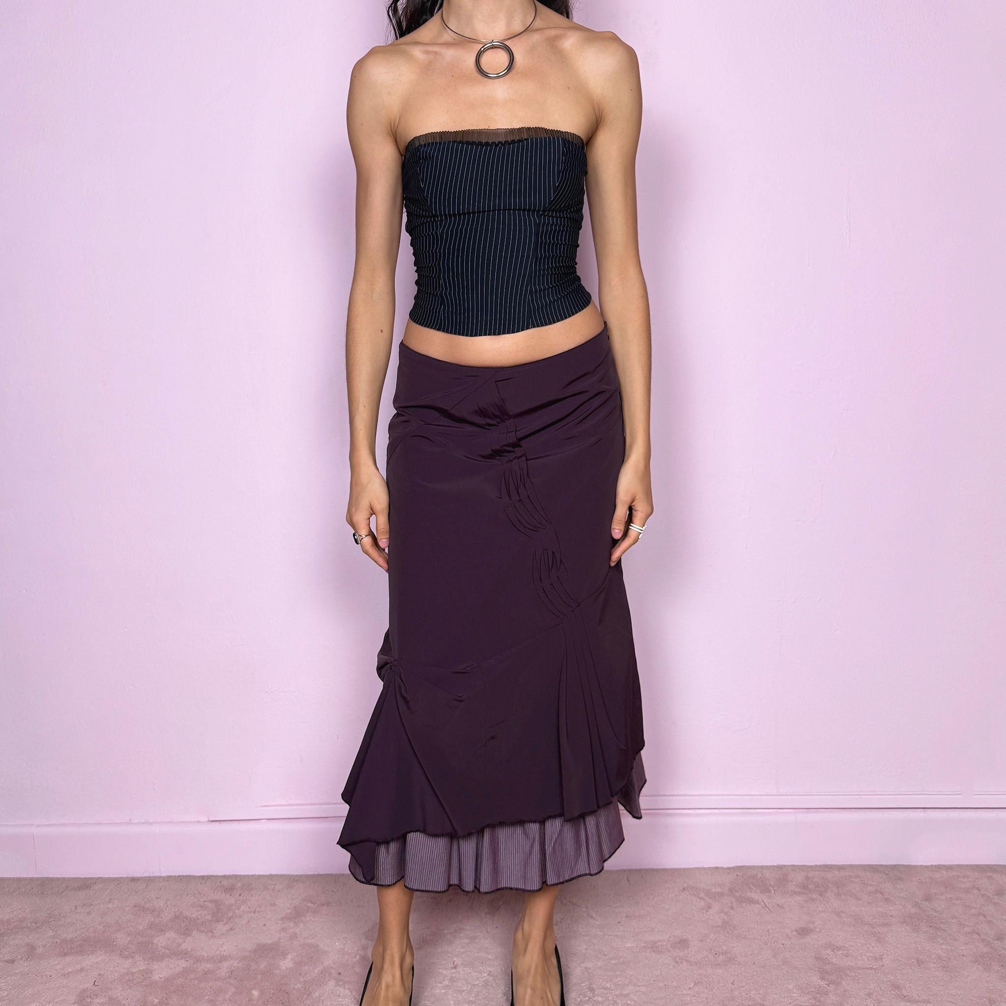 Vintage 2000s avant garde purple midi skirt with a deconstructed draped design, ruched detailing, and an asymmetric ruffle hem. Side zip closure with no stretch. Can be worn mid rise for size S or high waisted for size M. Made by a French brand. Excellent vintage condition.