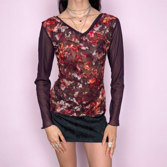 Vintage 2000s romantic dark purple semi sheer long sleeve top featuring layered mesh construction with a textured lace overlay in red and burgundy tones, creating a rich dimensional effect. Stretchy with a fitted silhouette, perfect for evening, spring, or night wear with a soft fairycore feel. Made in France from a polyester blend. Great vintage condition.