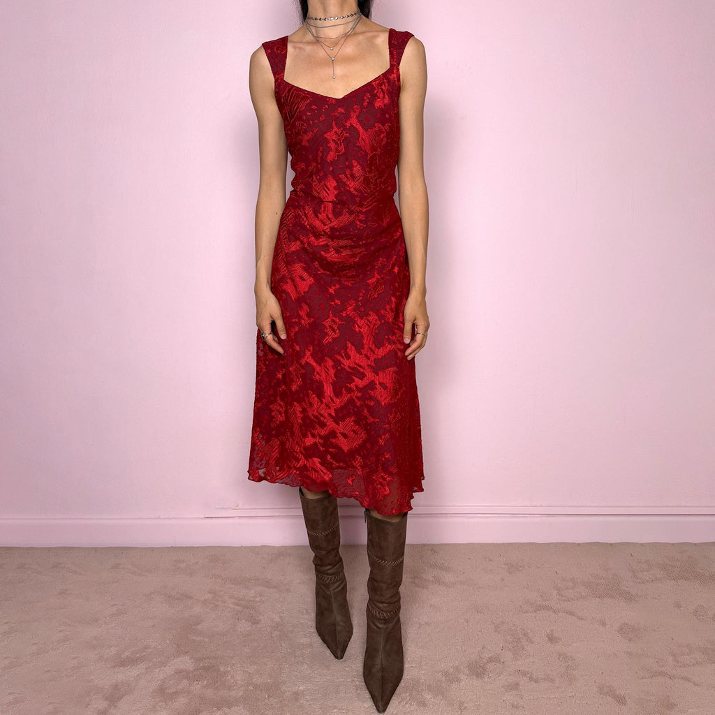 Vintage 2000s red and burgundy flared midi dress in a rich textured fabric with a semi-sheer abstract effect throughout and wide shoulder straps. The deep red tone and texture give the piece a romantic 90s / early 2000s evening feel, perfect for date nights and special occasions. Made from non-stretch polyester. Excellent vintage condition.