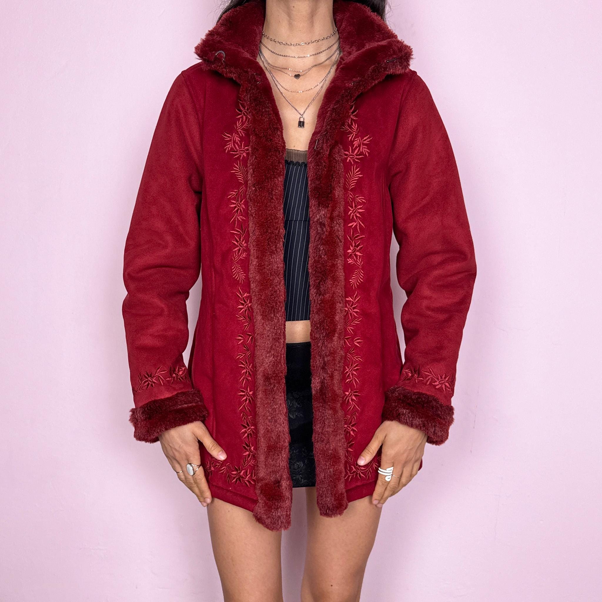 Vintage 2000s Penny Lane style coat in a deep red tone featuring rich embroidery and plush faux fur trim at the collar, cuffs, and interior. Designed with a cozy structured fit, pockets, and hook closure for a bold bohemian statement. Perfect for winter with a soft fairycore feel. Made from a polyester acrylic blend. Excellent vintage condition.