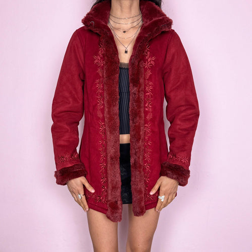 Vintage 2000s Penny Lane style coat in a deep red tone featuring rich embroidery and plush faux fur trim at the collar, cuffs, and interior. Designed with a cozy structured fit, pockets, and hook closure for a bold bohemian statement. Perfect for winter with a soft fairycore feel. Made from a polyester acrylic blend. Excellent vintage condition.